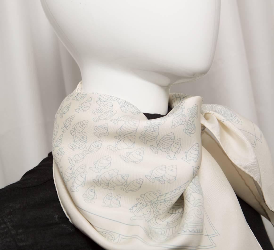 Cream printed light blue 'Reniuntre Oceane' large cream scarf.