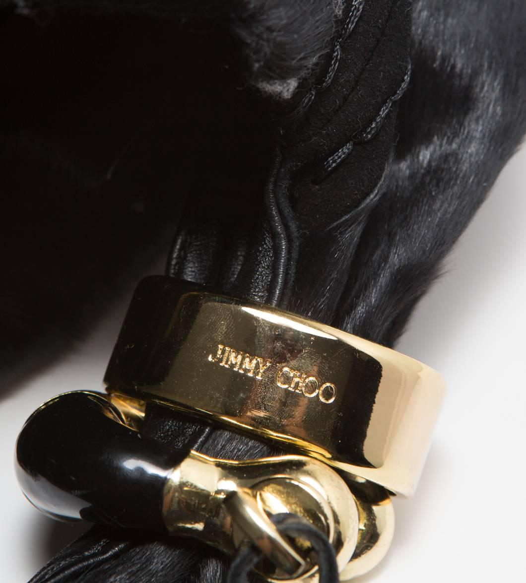 gold jimmy choo bag