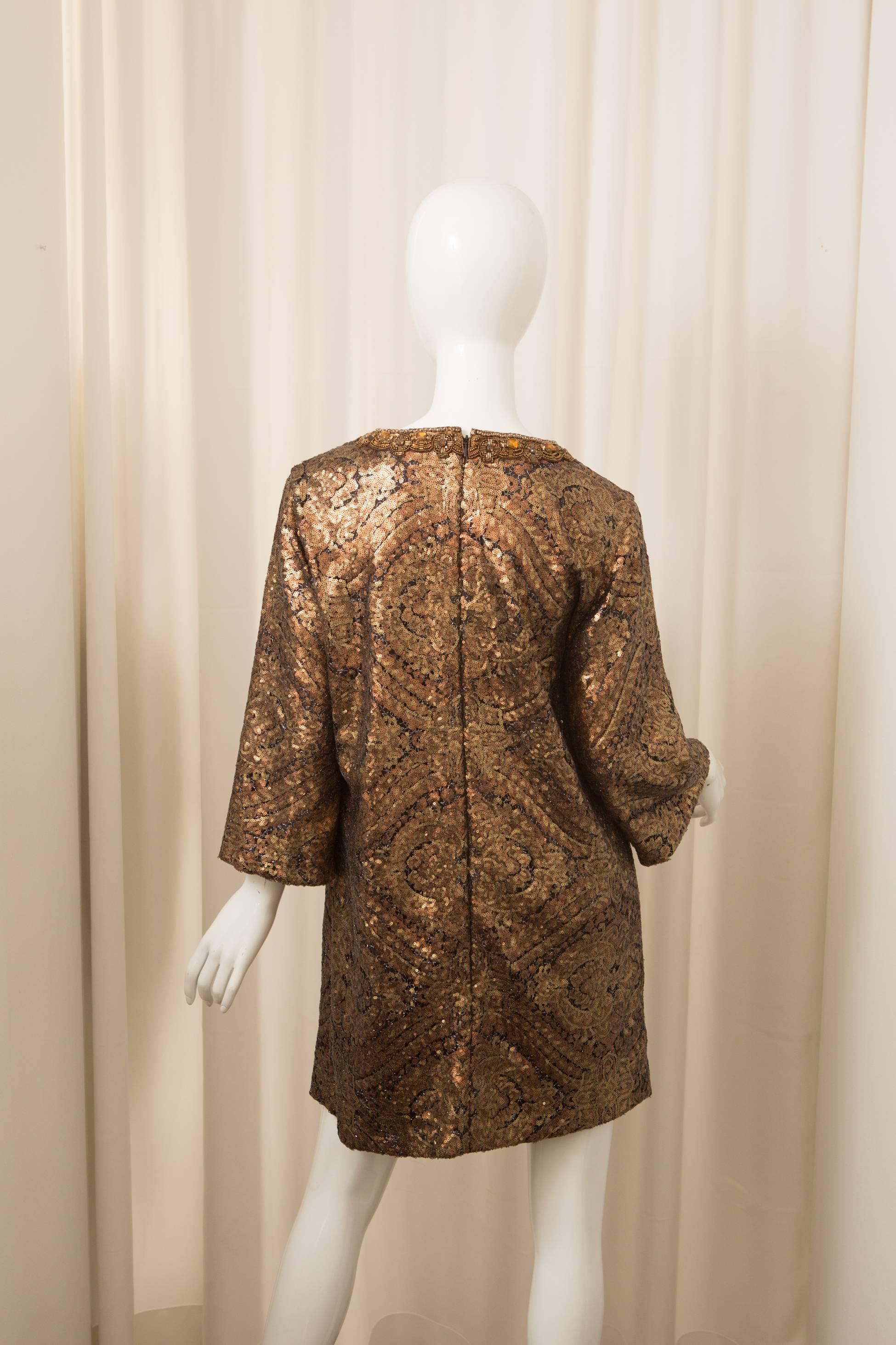 Bronze sequin tunic dress with 3/4 sleeves. 
