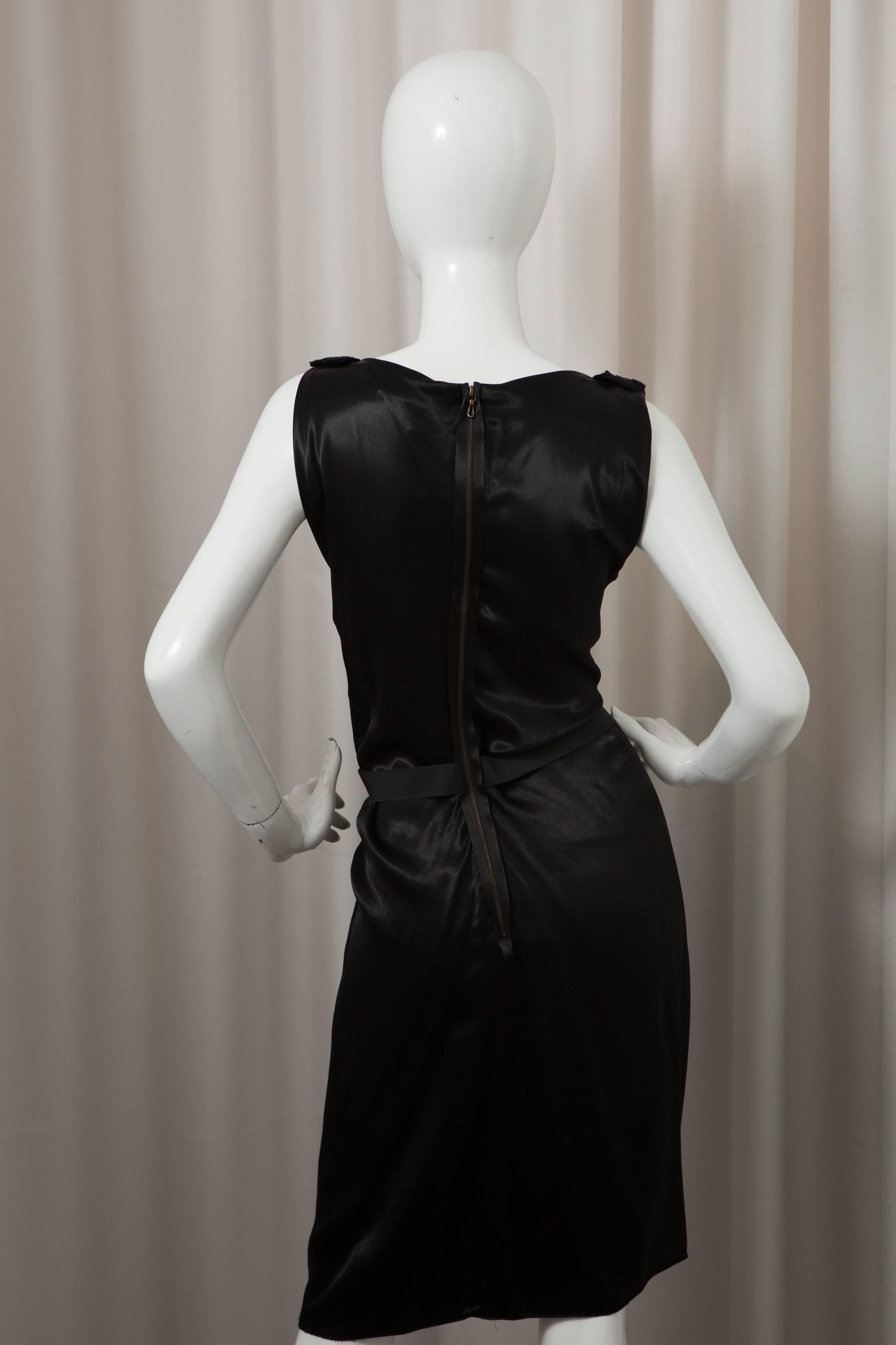 Black seep v-neck dress with elastic waist detail and exposed zipper back. 