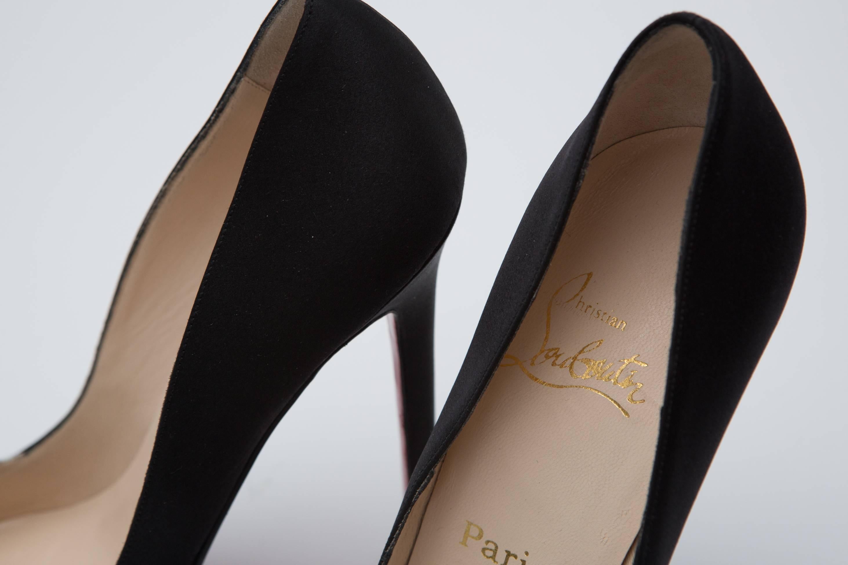 Women's Christian Louboutin Black and White Pointy Toe Pumps