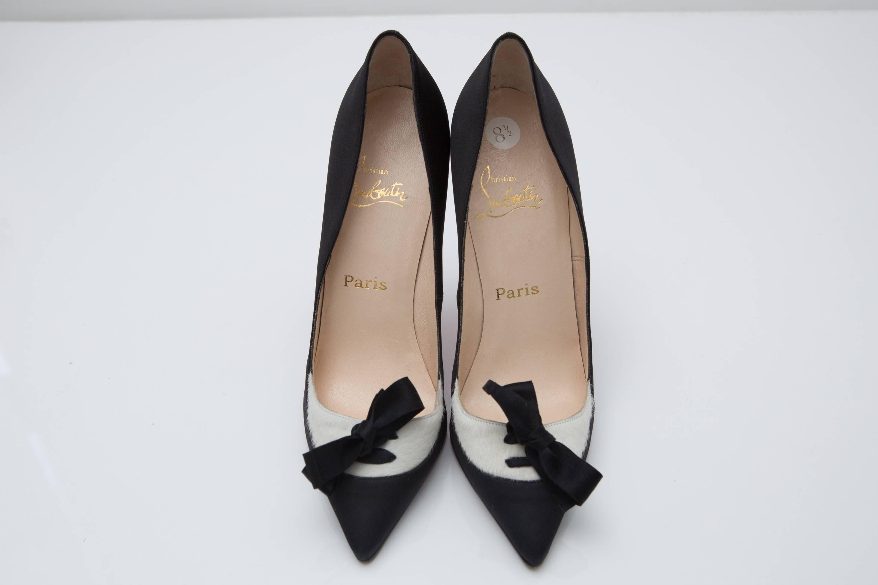 'So Kate' style pony hair pointy toe pumps with lace up detail.