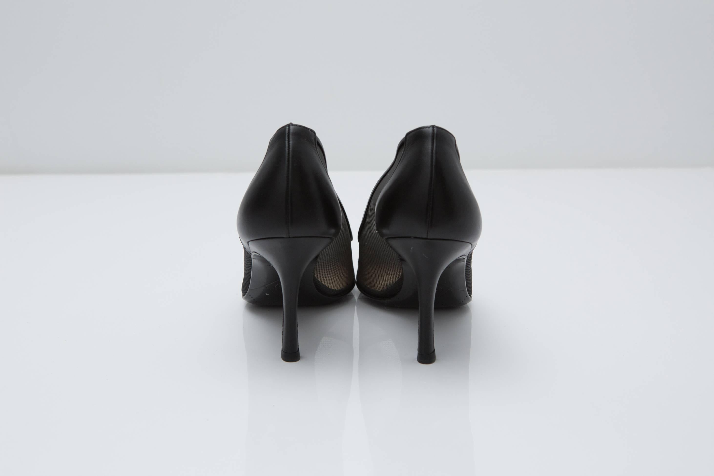 Black  leather and mesh kitten heel pointy toe pumps with 