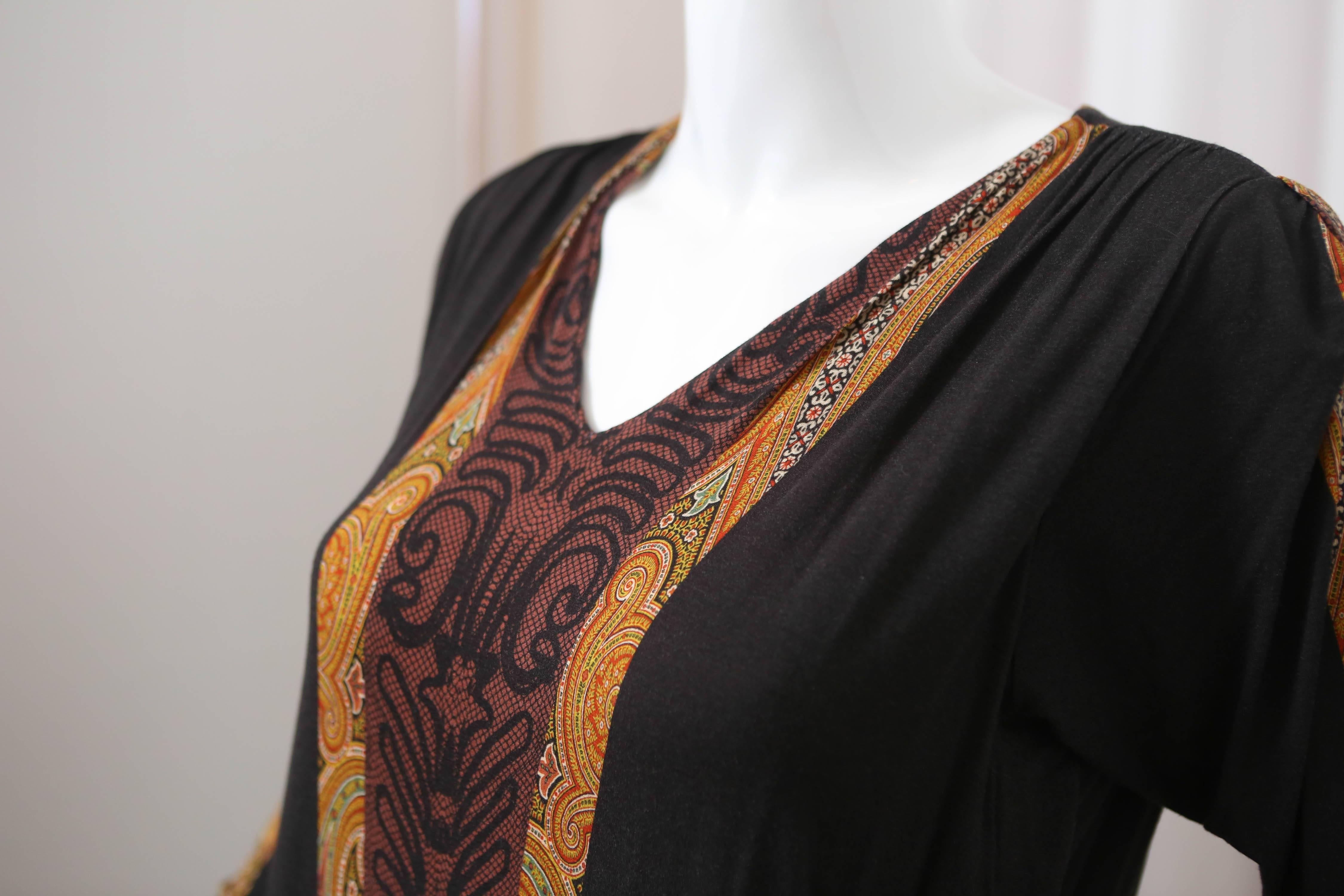 Black cashmere long sleeve paisley printed v-neck dress with shoulder rouching detail.