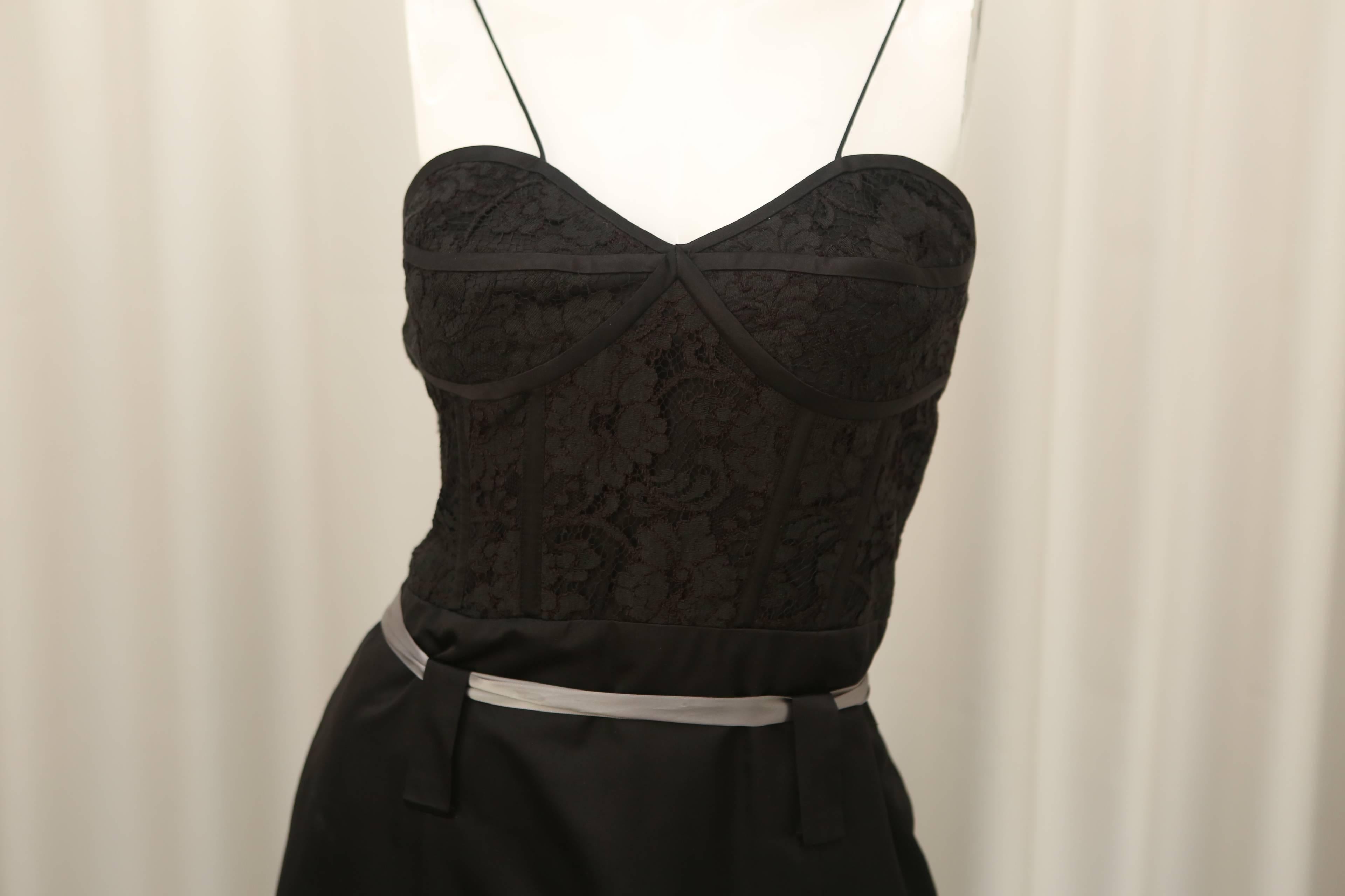 Yigal Azrouel black gown with thin straps, lace detail at bodice and grey satin belt.  New W/ Tags.