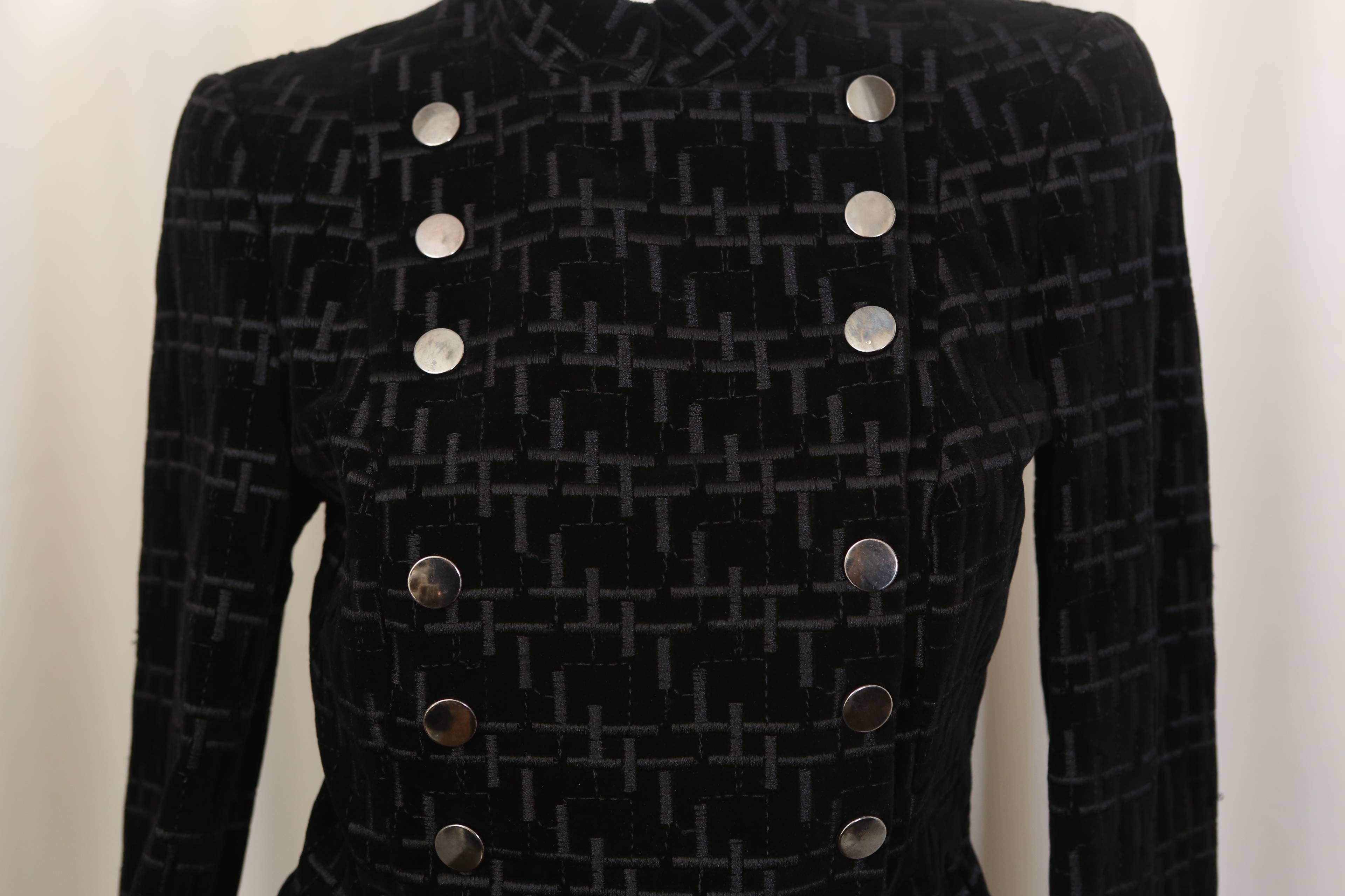 Giorgio Armani black patterned long sleeve jacket with double breasted snap closure.

Sleeve Length: 22"