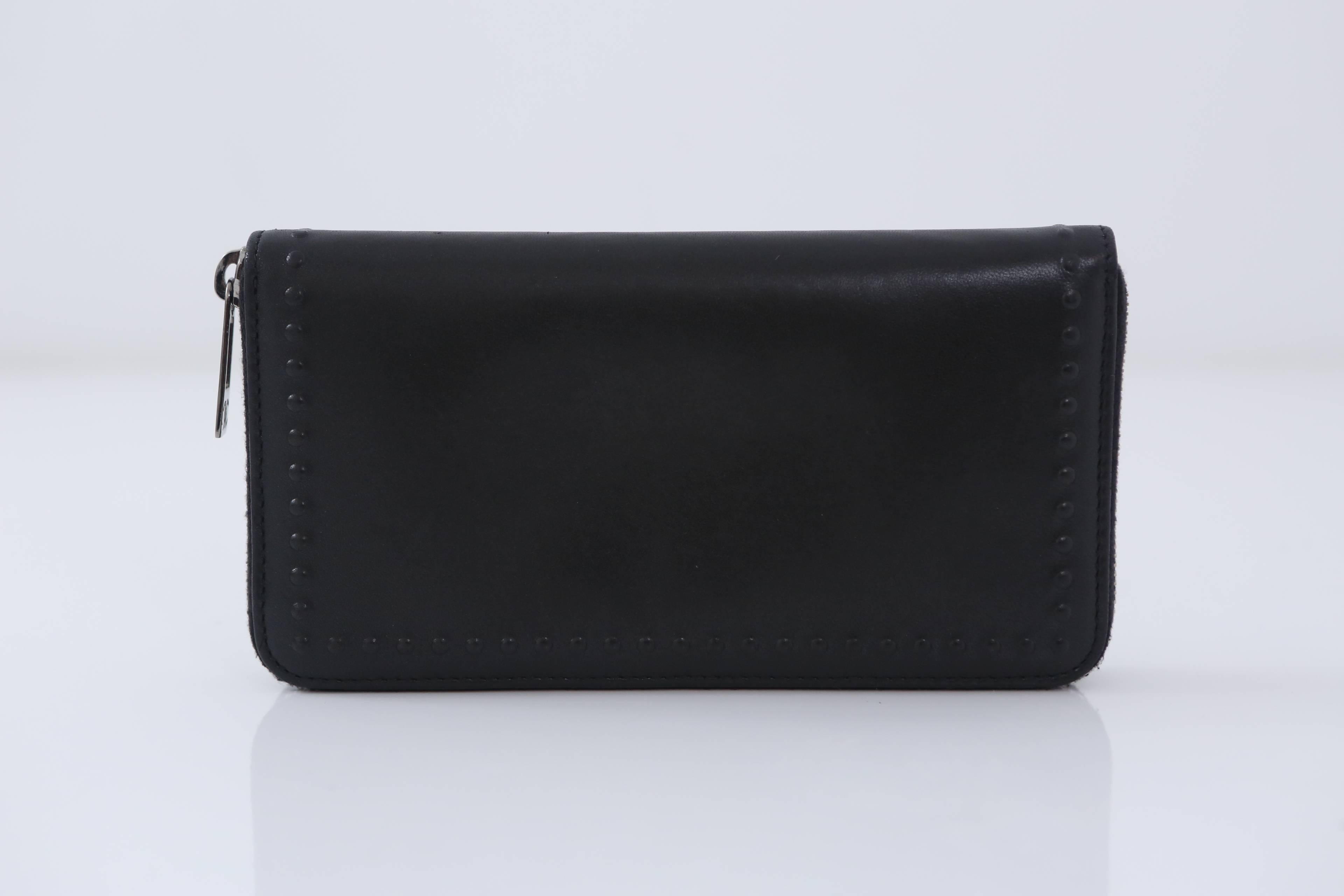 Chanel 2013-2014 Black Leather Bi-Fold Wallet In Excellent Condition In Bridgehampton, NY