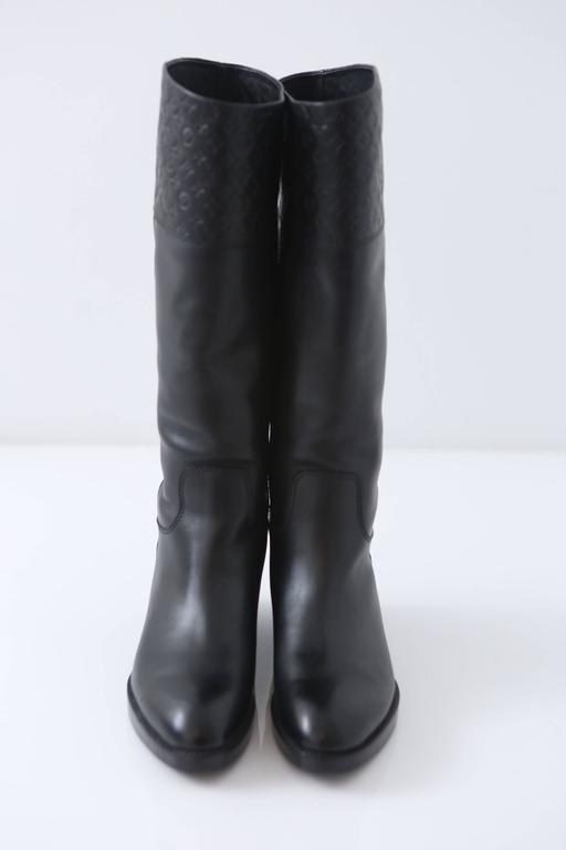 Louis Vuitton Black Leather Riding Boots W/ Embossed Monogram For Sale at 1stdibs