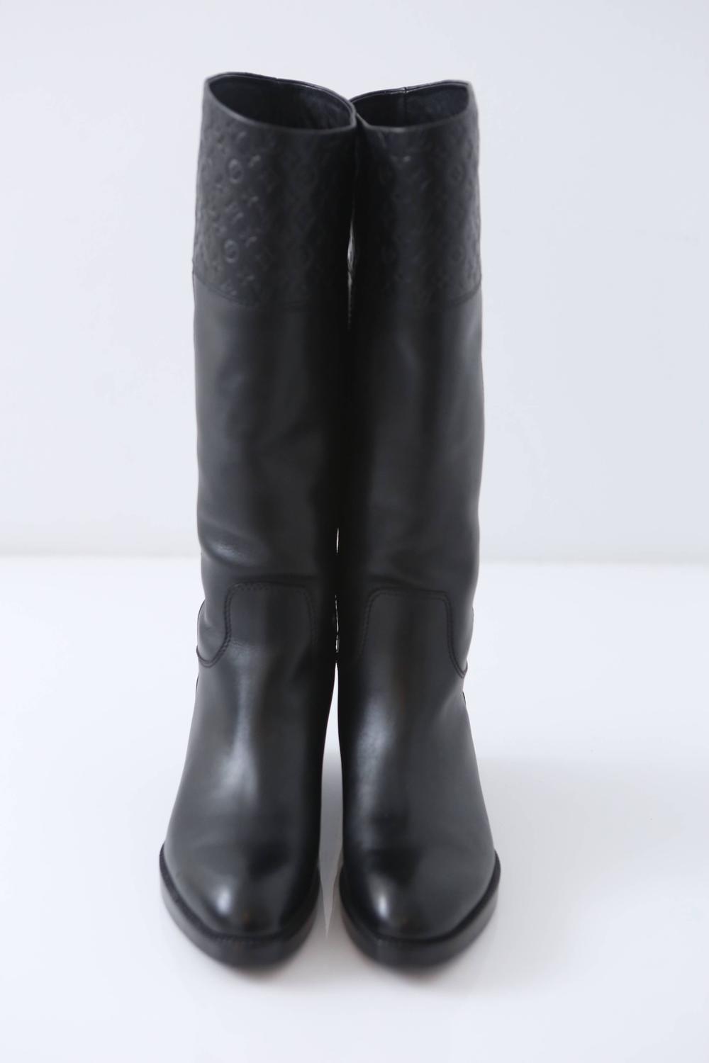 Louis Vuitton Black Leather Riding Boots W/ Embossed Monogram For Sale at 1stdibs