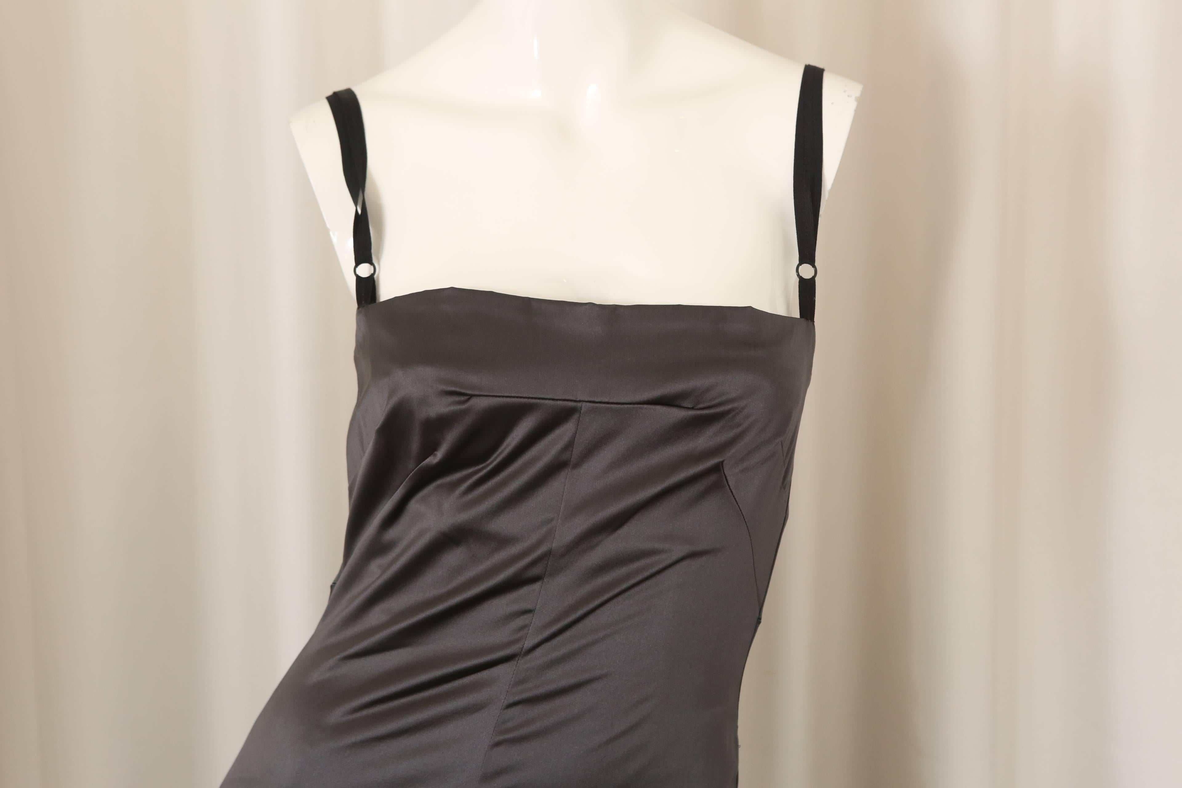 Dolce & Gabbana strapless black/grey mid-calf length dress with back slit and built in bustier bodysuit.  Hook & eye closure. 

