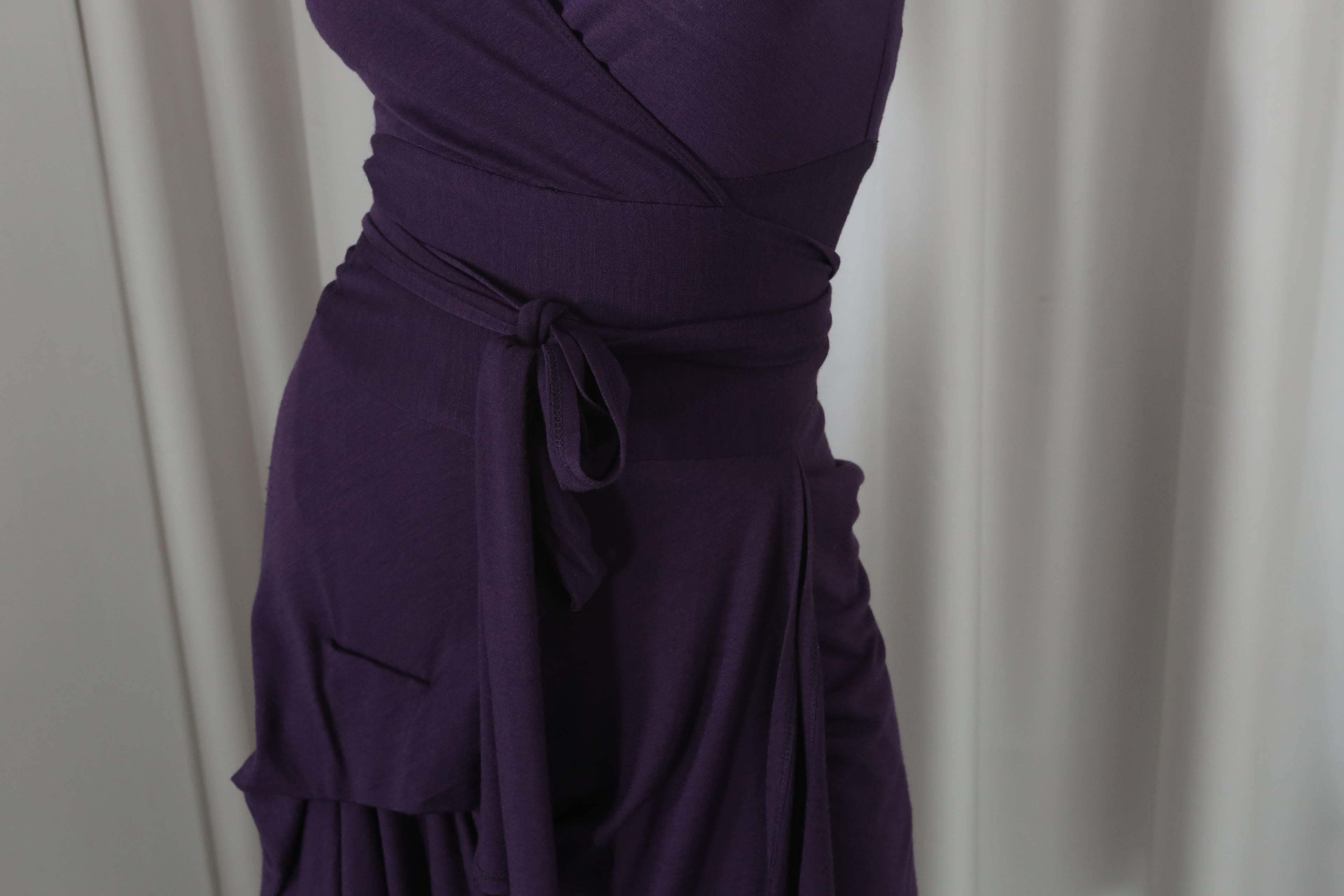 Morgane Le Fey purple short sleeve wrap dress with gathering at bottom.  