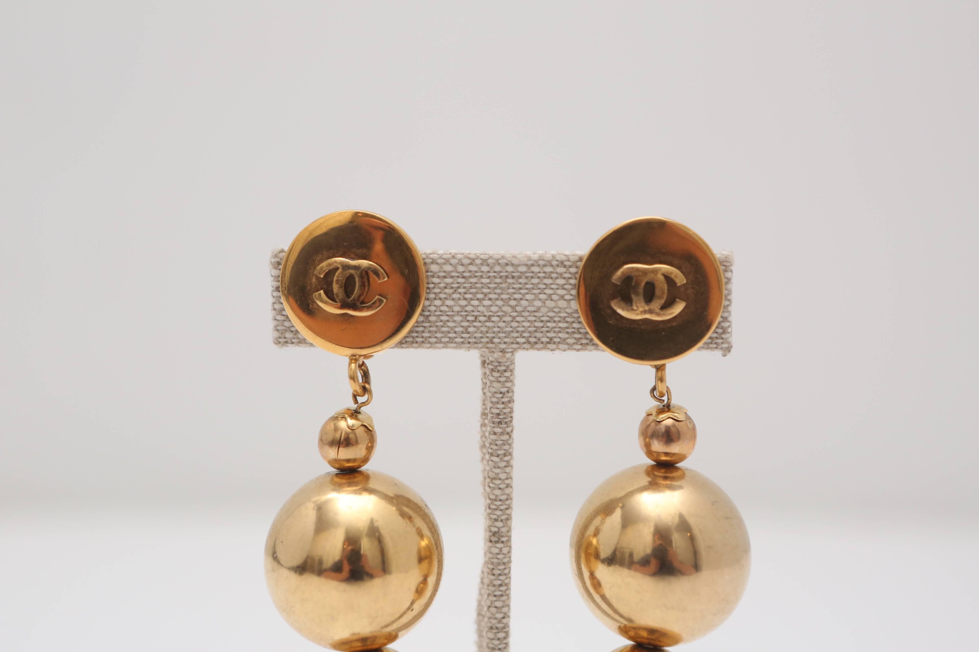 Chanel runway 'CC' clip-on tassel earrings with ball detail. 

*Left Earring Slightly crooked