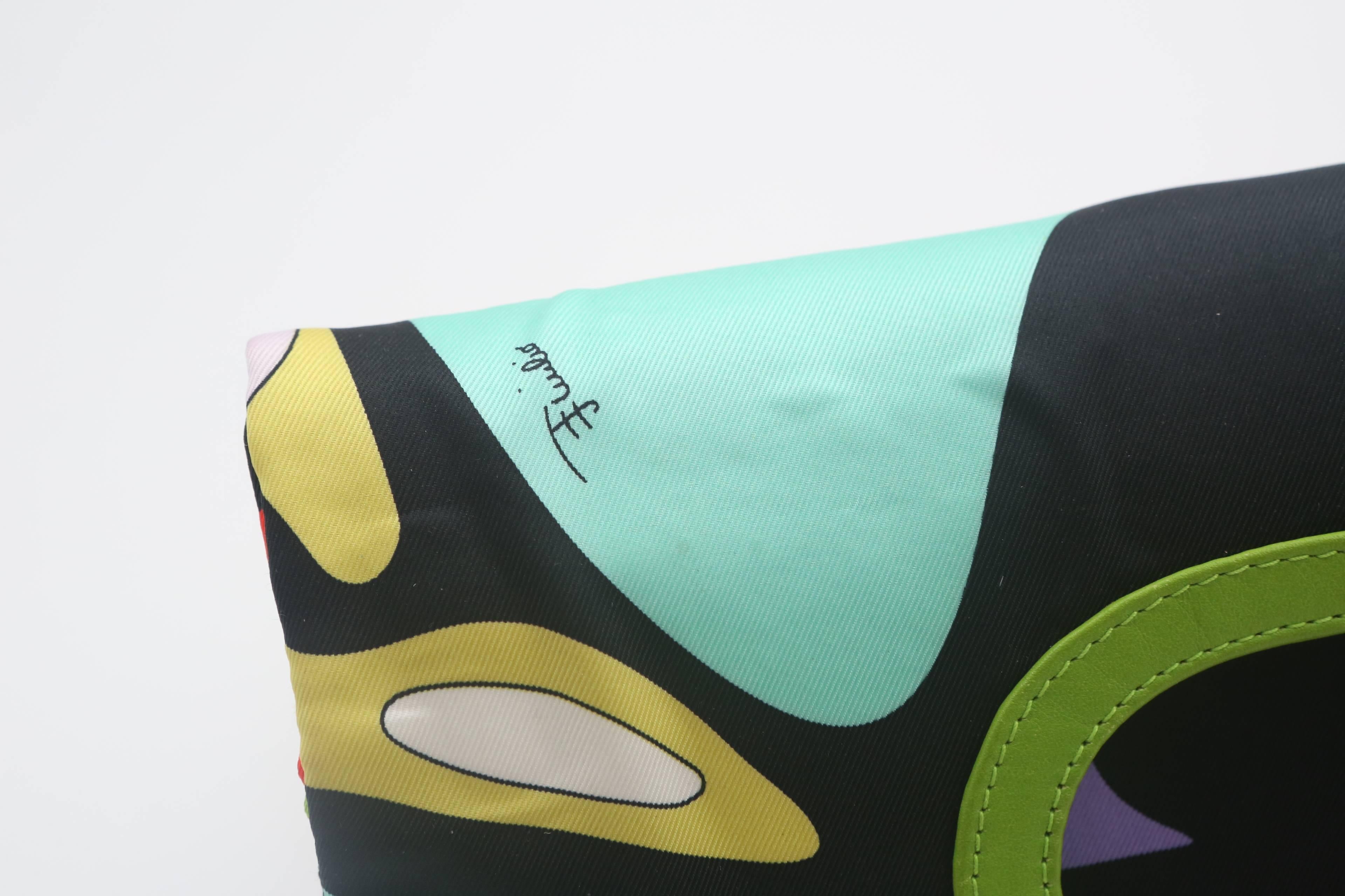 Emilio Pucci multi colored, signature printed, foldover clutch w/ green leather detail on handle & inside.  