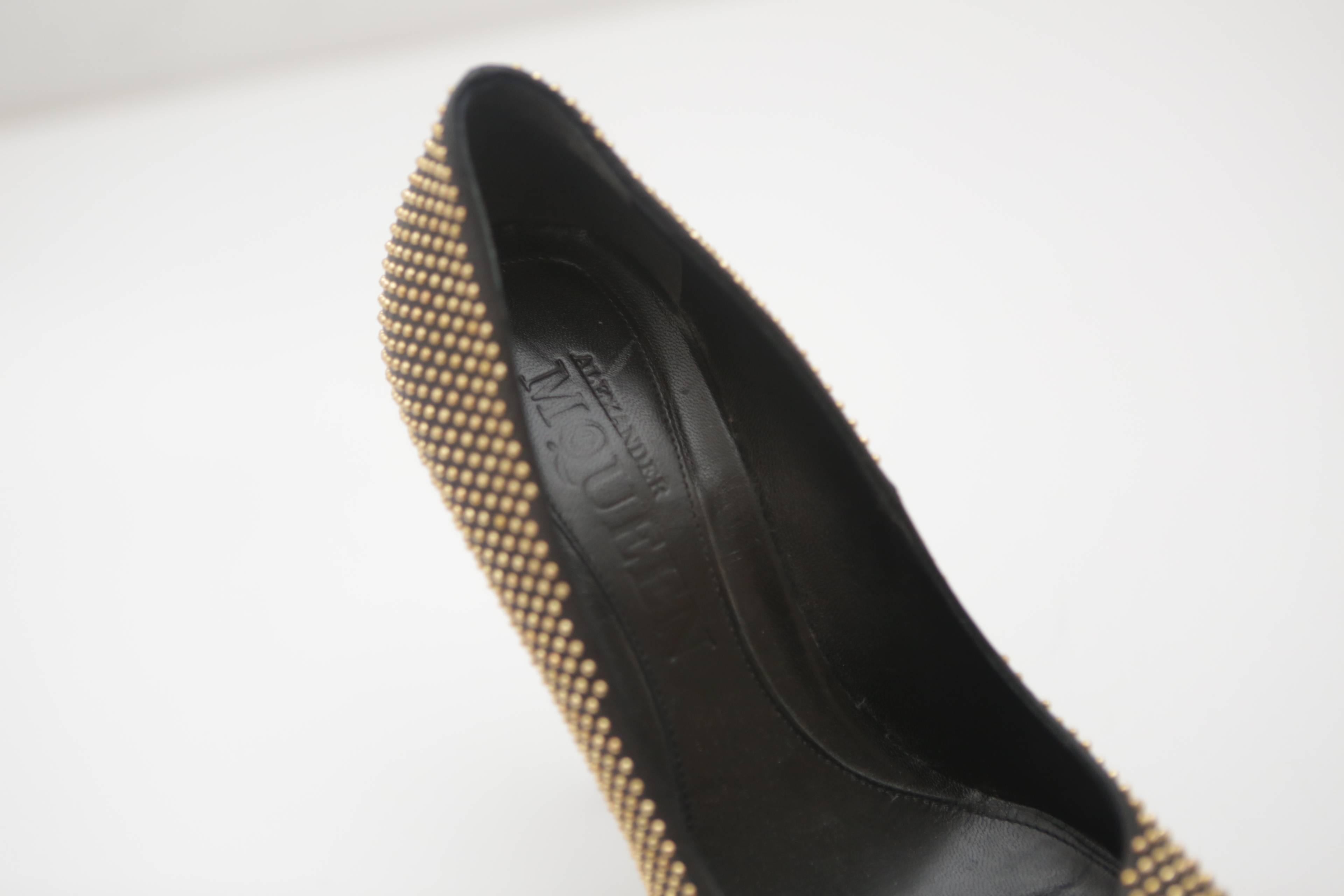 Alexander McQueen gold-studded almond toe pumps. Leather upper with gold-metal studs 5
