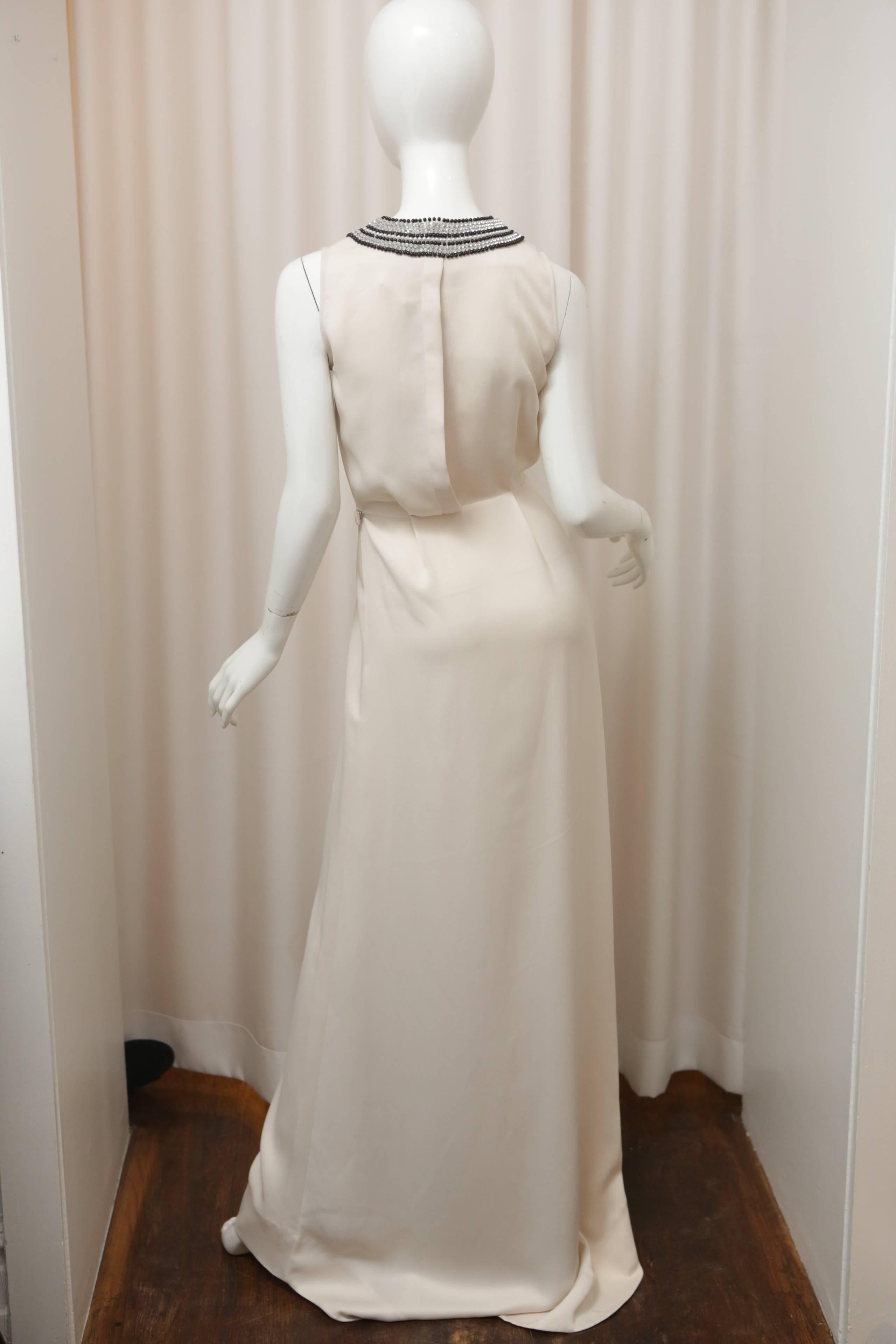 Malene Birger sleeveless deep v-neck floor length dress with gathered waist and crystal beading around collar.