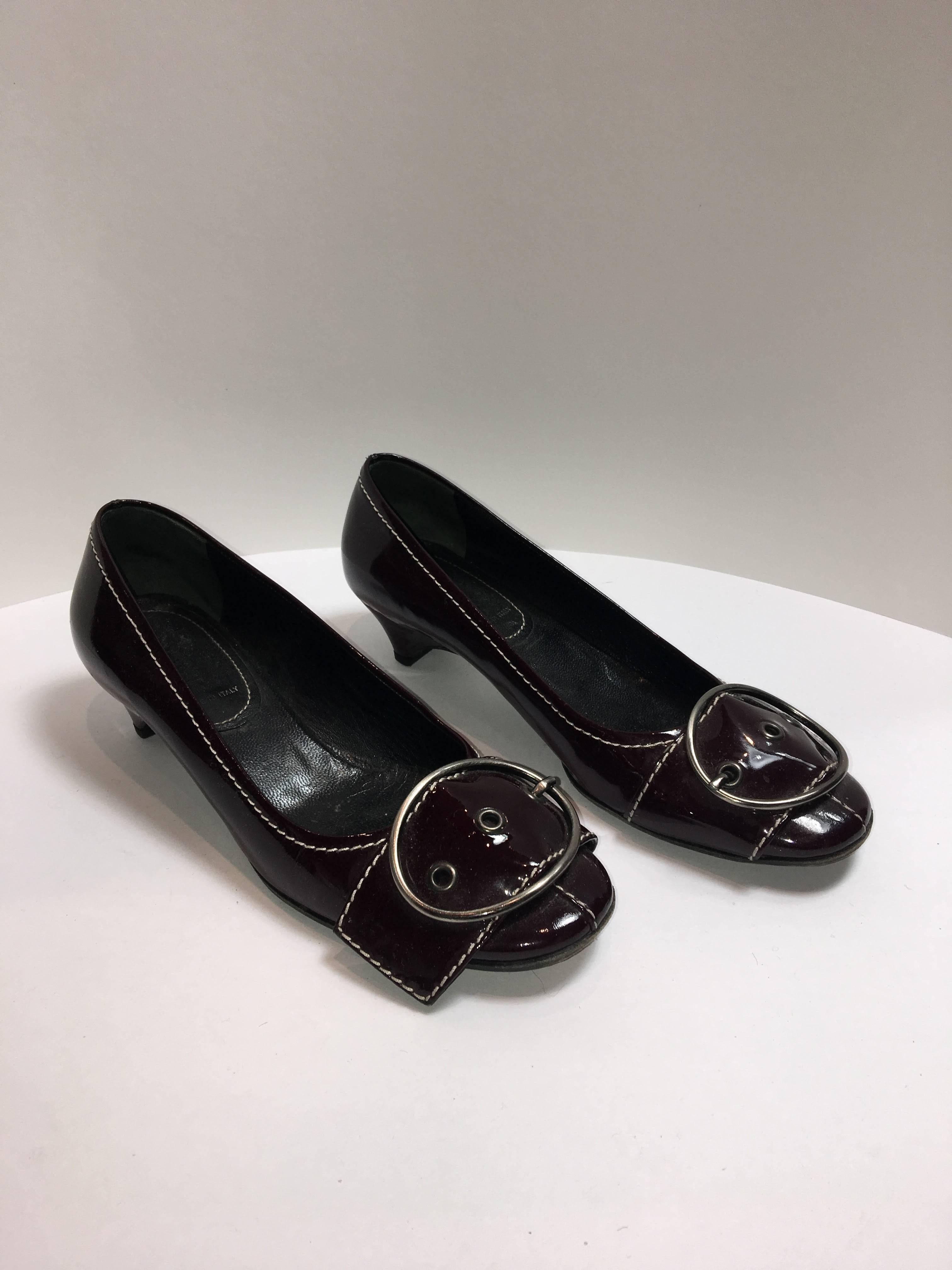 MiuMiu Dark Red Patent Leather Kitten Heel with big buckle detail on toe. 