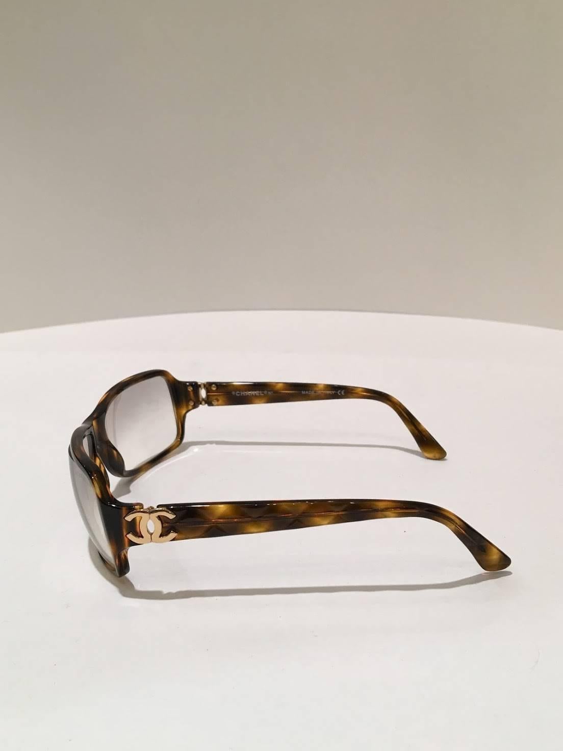 Chanel Tortoise Eyeglasses with Crosshatch arm detail and Gold Logo.