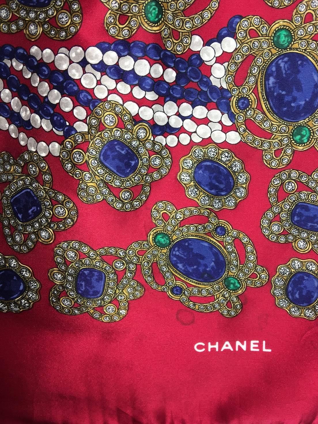 Bijoux Chanel Silk Scarf. Red background with Blue, Yellow, and White details. 