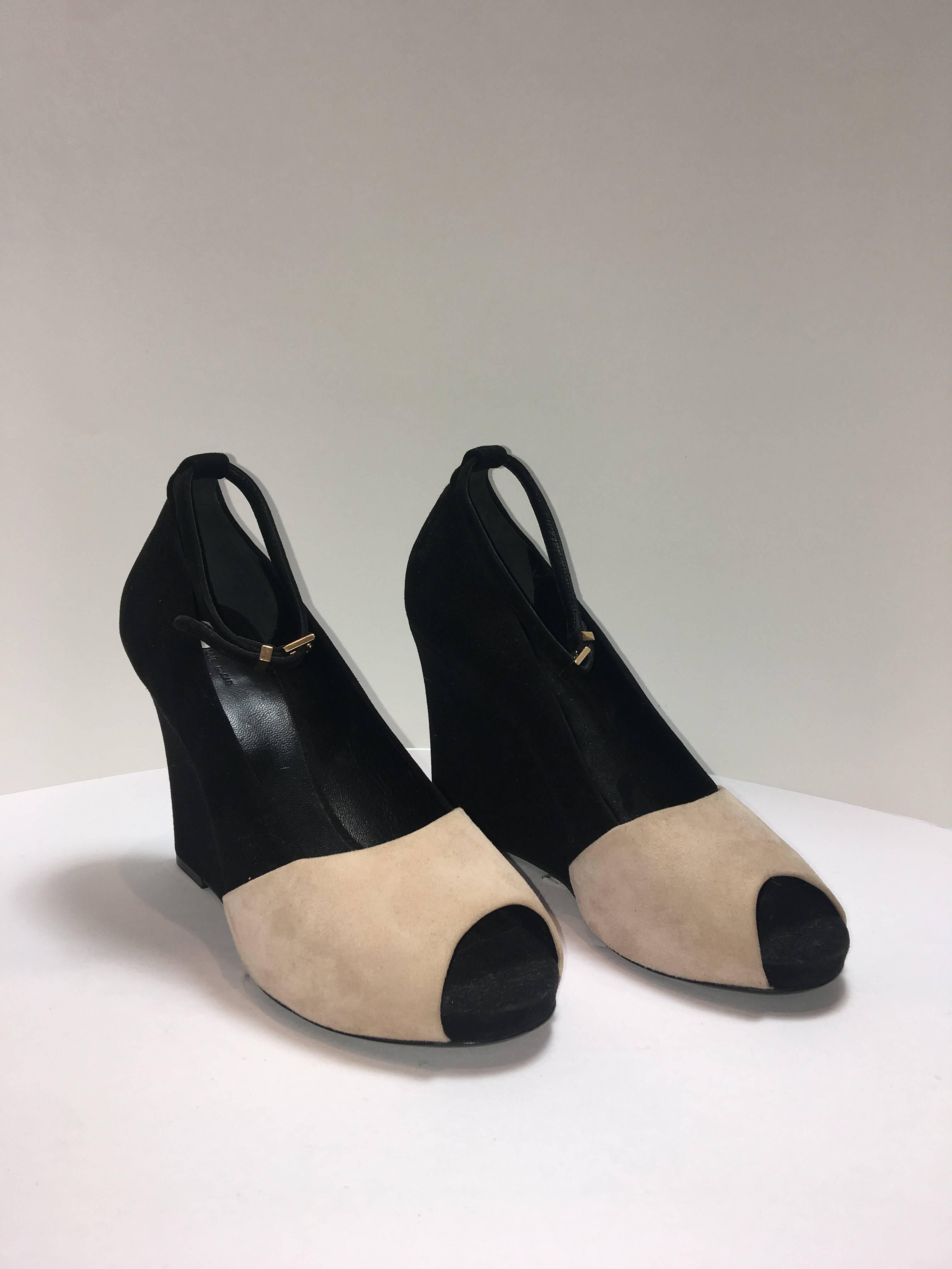 Celine Blush/ Black Suede with a peep-toe. Ankle Straps and wedge in size 10.5