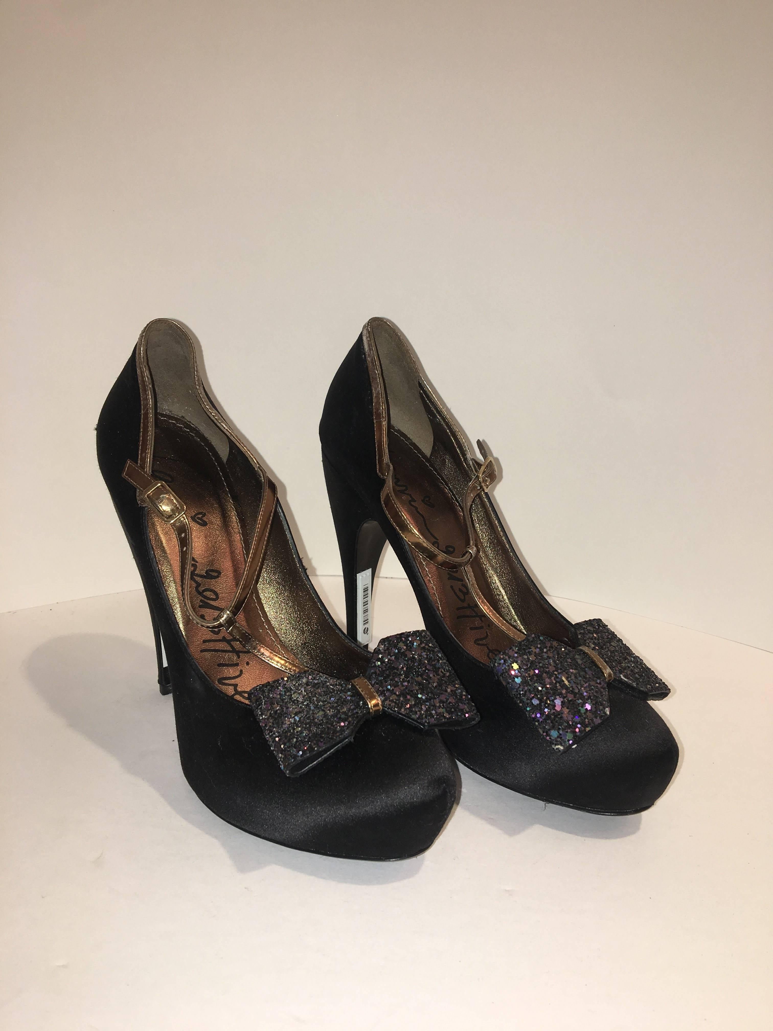 Lavin Satin Heels with a T-Strap. Size 38.5 with a Glitter Sequined bow at the Toe. 