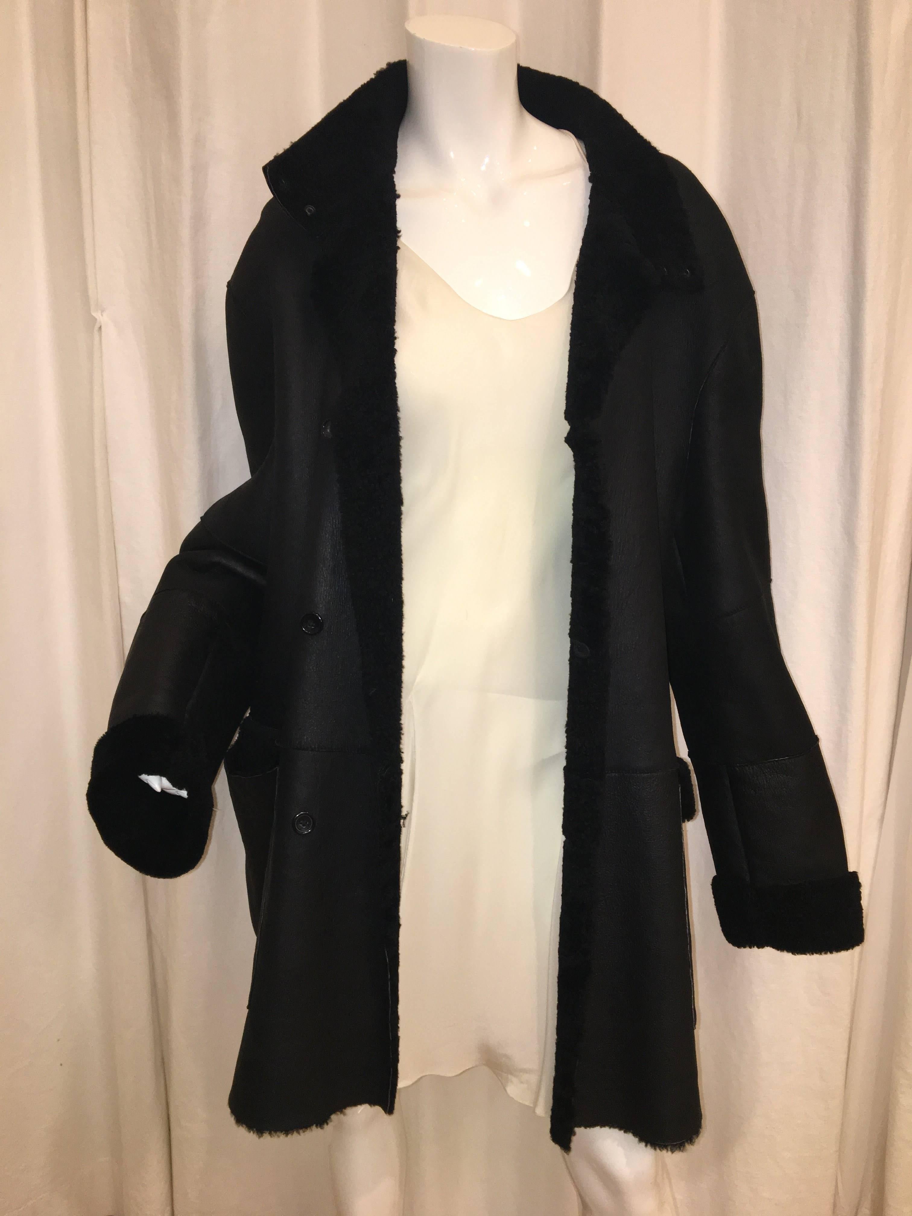 Burberry Black Leather with Shearling Lining Coat. 3 Button Front with Short Collar. 