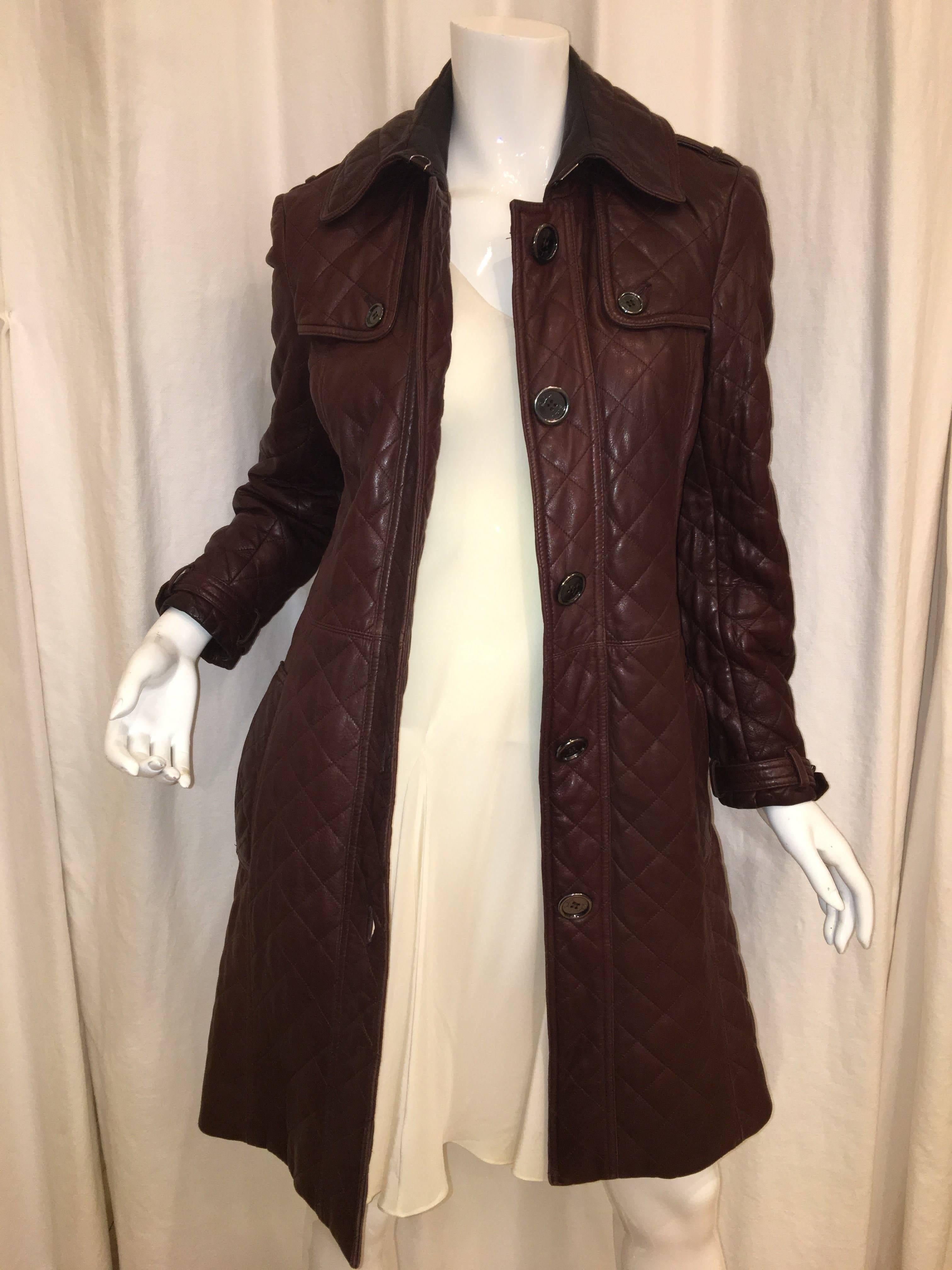 Brown Burberry Leather/ Lambskin Single Breasted Quilt Trench Coat with Gunmetal Buttons.