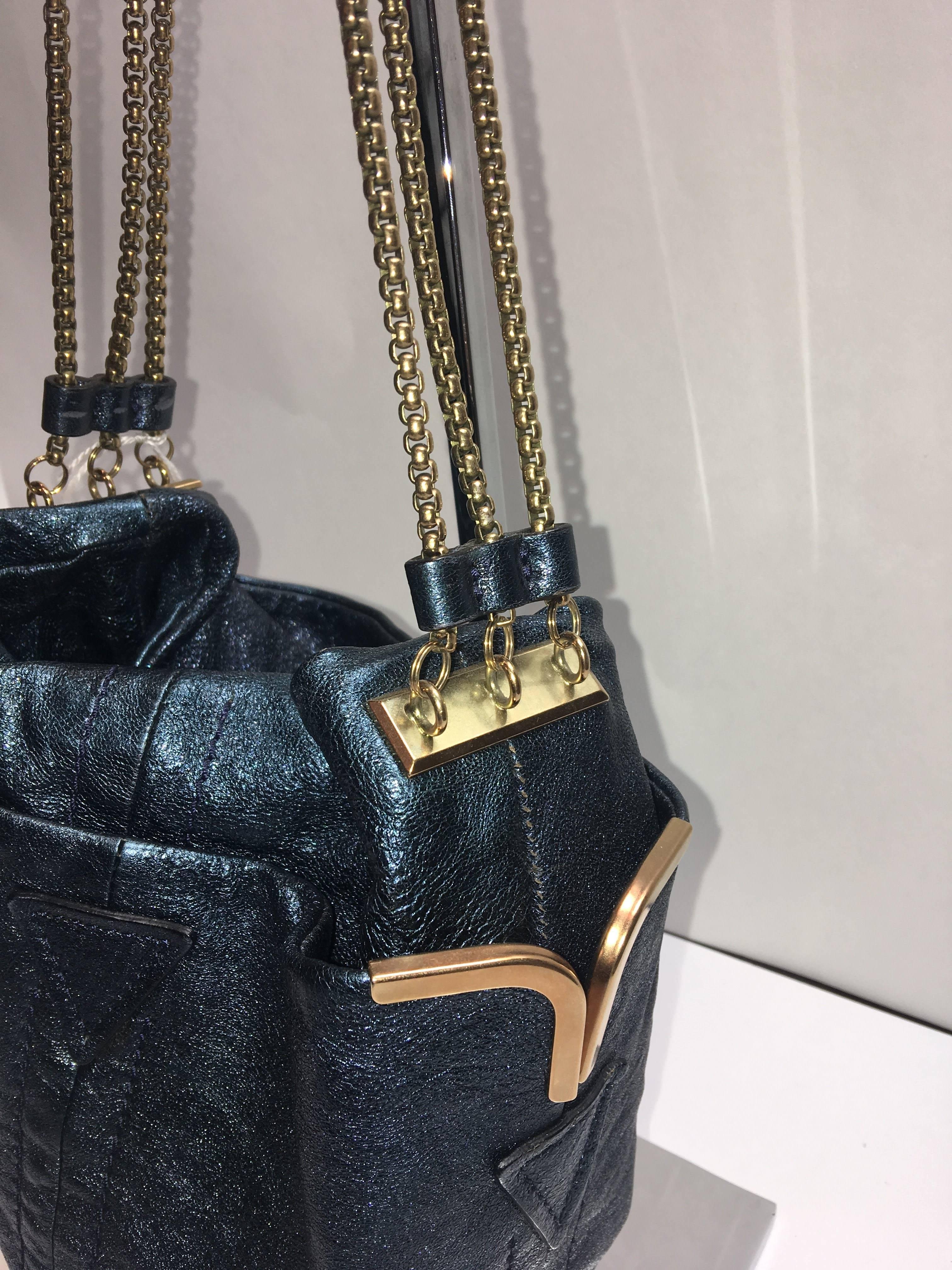 Chloe Blue Metallic Single Strap Shoulder Bag with Triple Gold Link and Magnetic Closure. 
