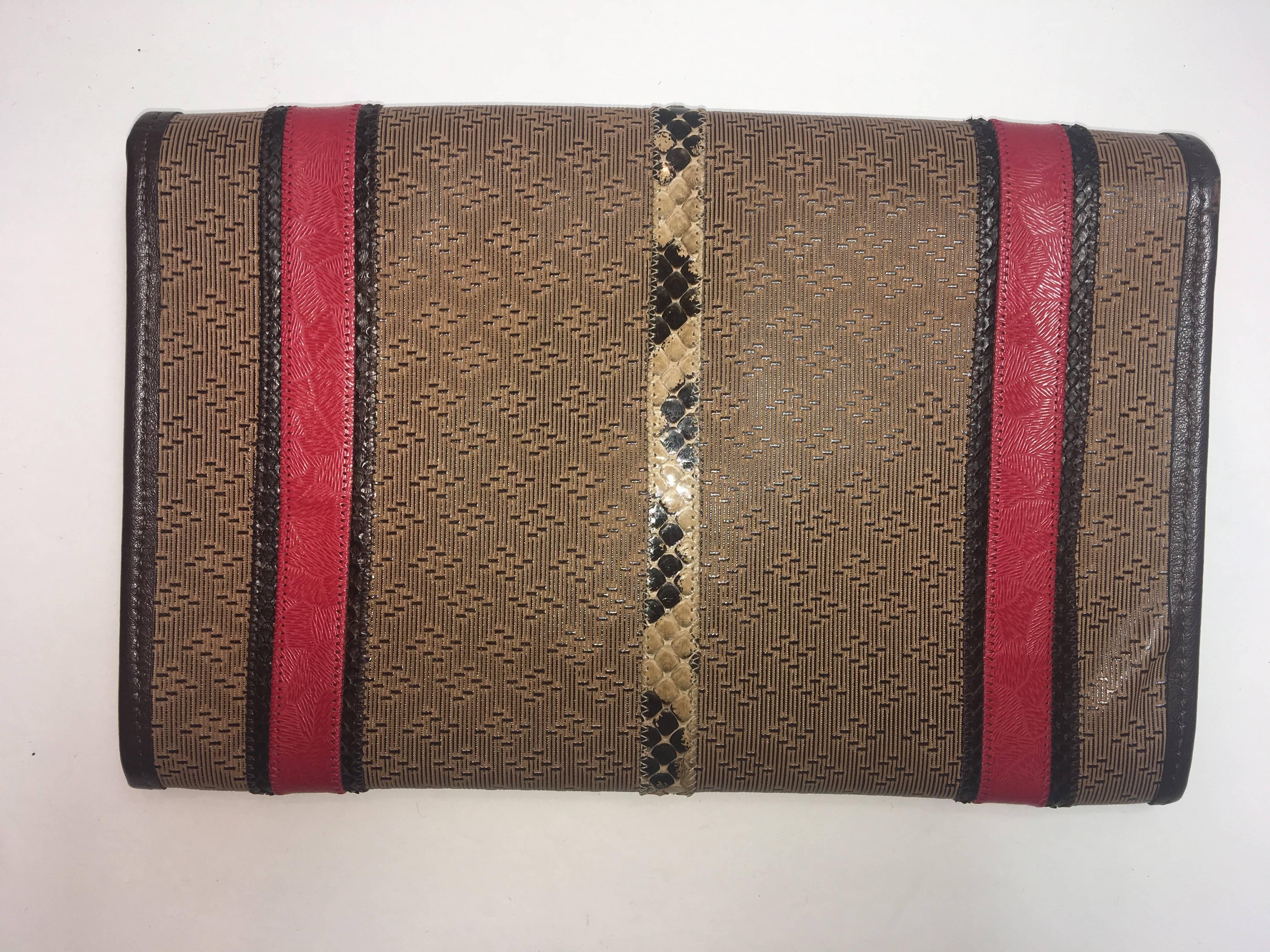 Carlos Falchi Leather Clutch with Fold Over Flap Closure, Multi Colored Aztec Pattern, and Leather Knotted Strap.