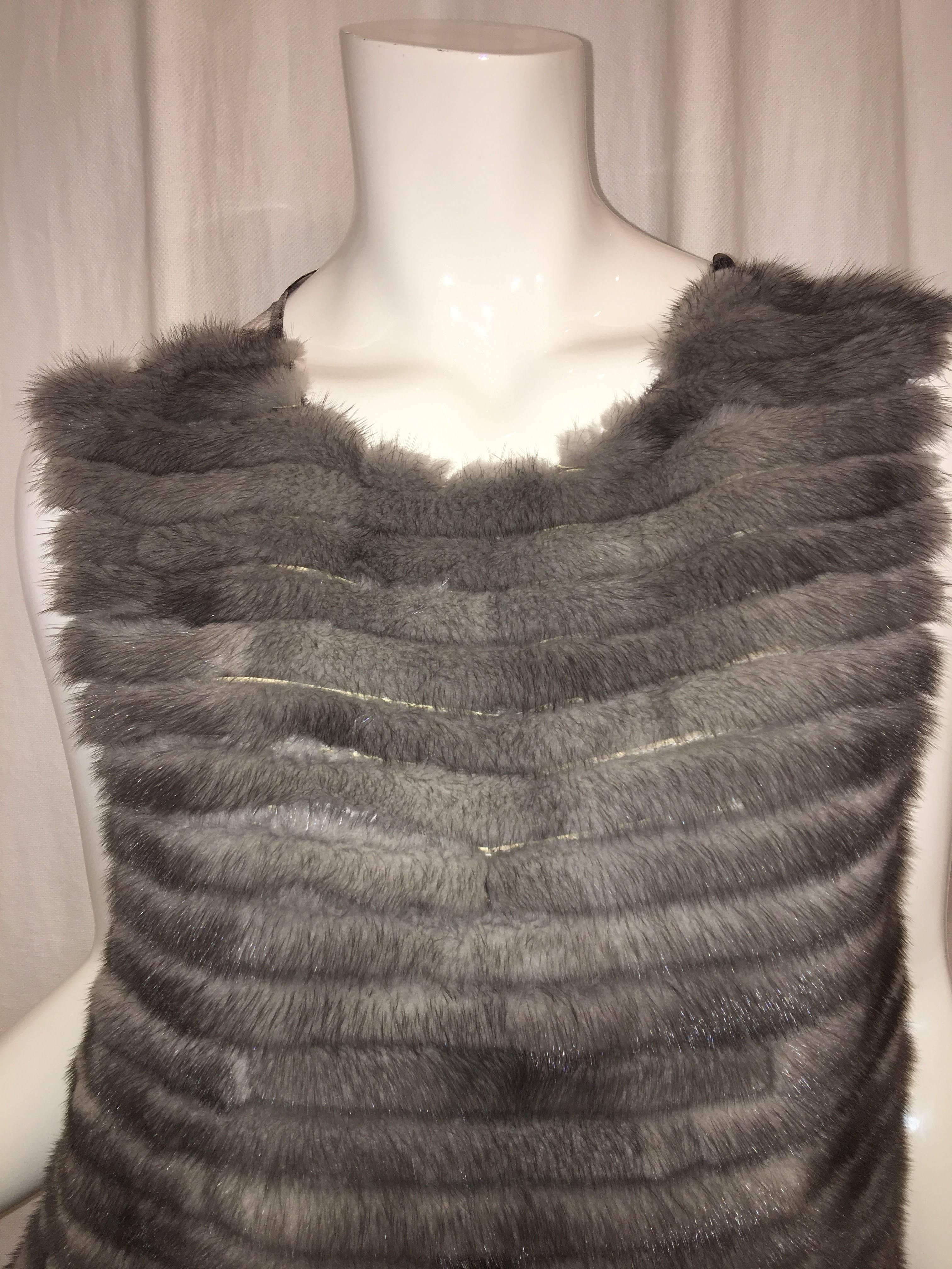 Vera Wang Collection Sleeveless Top with Tiered Fur Front with Patterned Silk Lining and Sheer Back. 
Available in Sizes 0 through 6! 