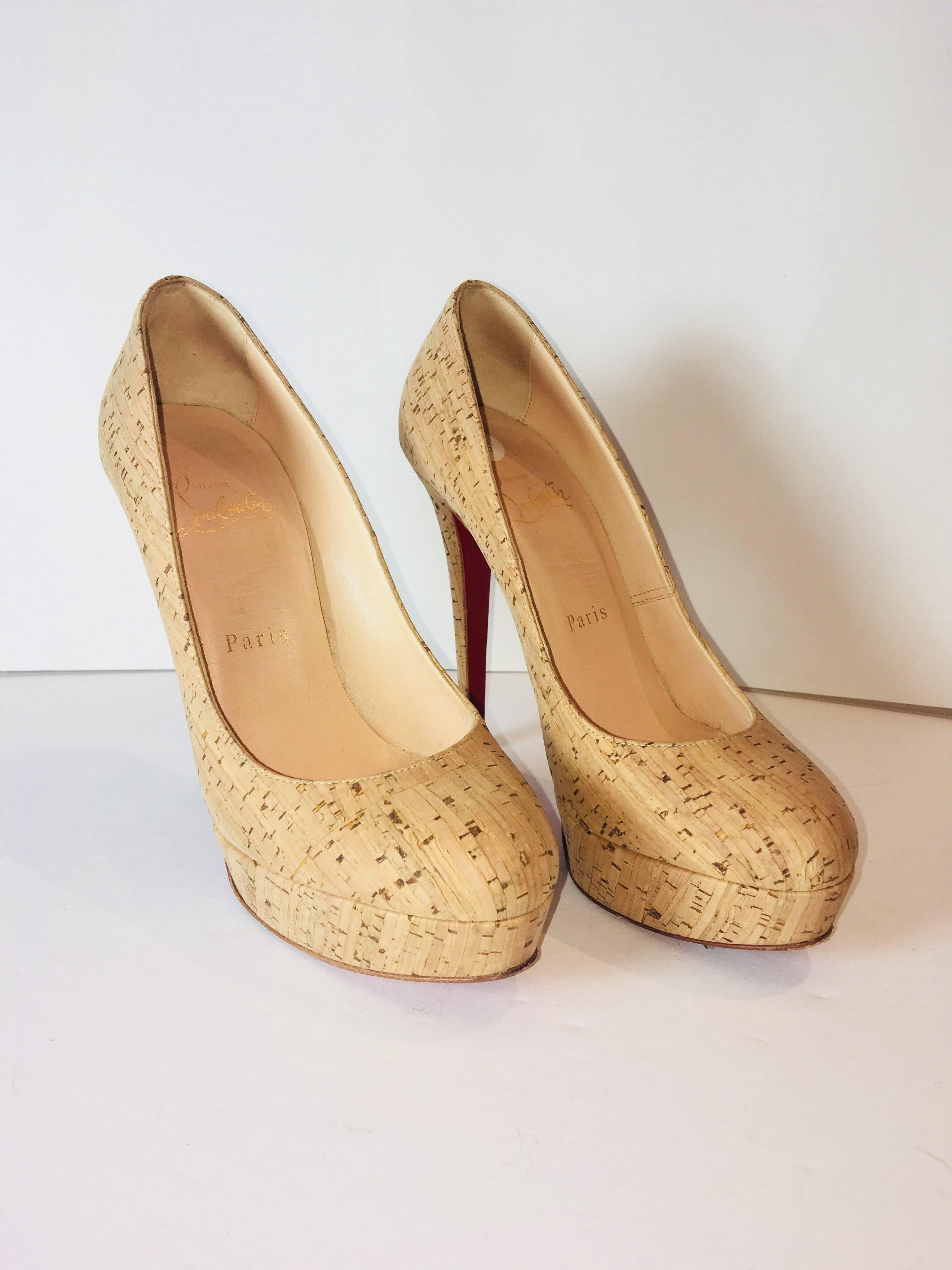 Christian Louboutin Cork Platform Heels with Signature Red Sole.