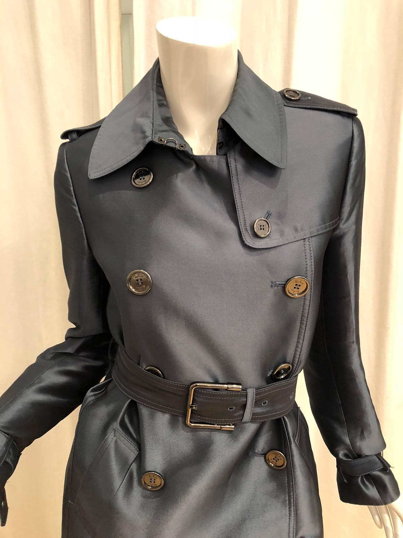 Burberry Double Breasted Short Trench Coat with Gun Metal Buttons and a Slim Fit.