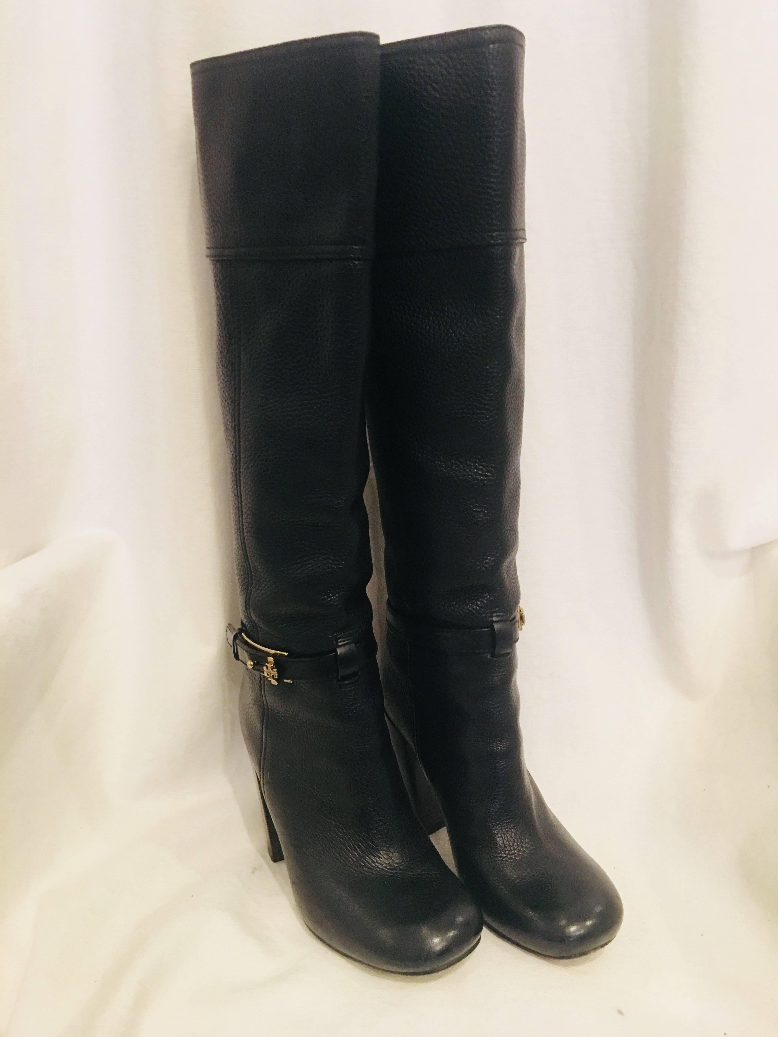 Tory Burch Pebbled Black Leather Boots with Buckle, Black Zipper, and Wooden Heel.