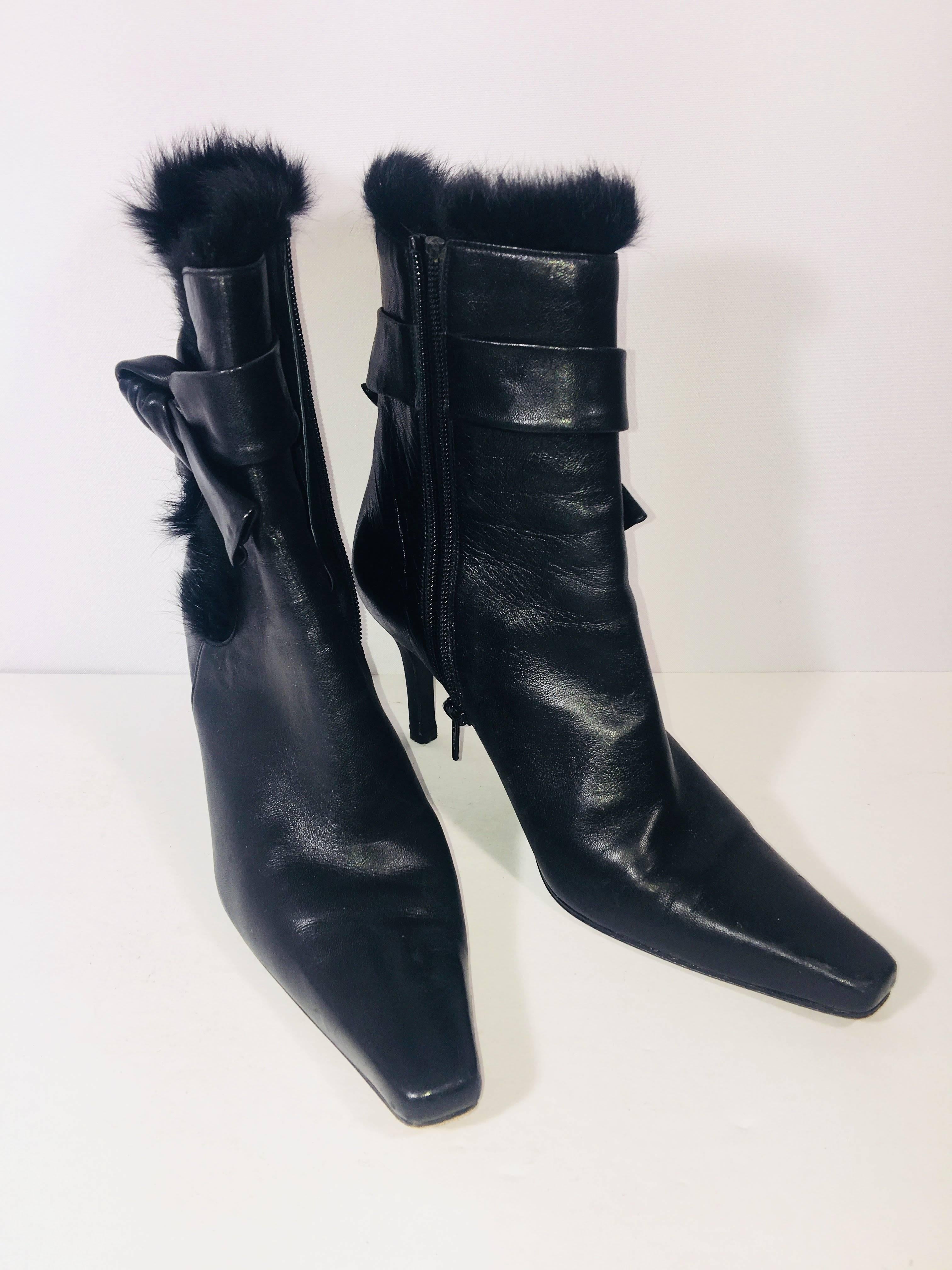 Stuart Weitzman Black Leather Ankle Boots with Bow Detail and Fur Around Ankle and Side Zipper.