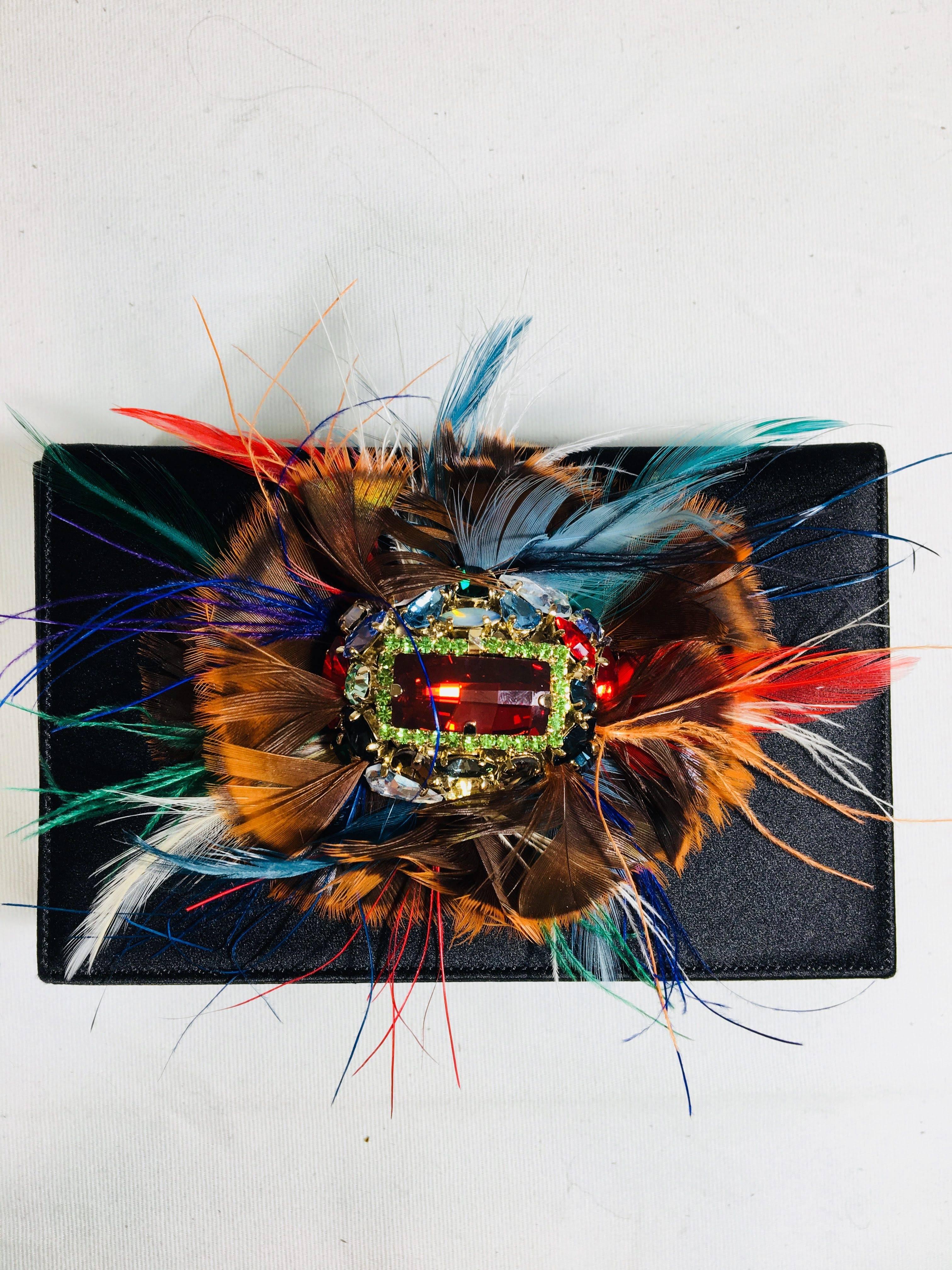 Renaud Pellegrino Clutch in Black Satin with Multi Color Feathers Surrounding a Multi Color Crystal. Small Magnetic Closure.
