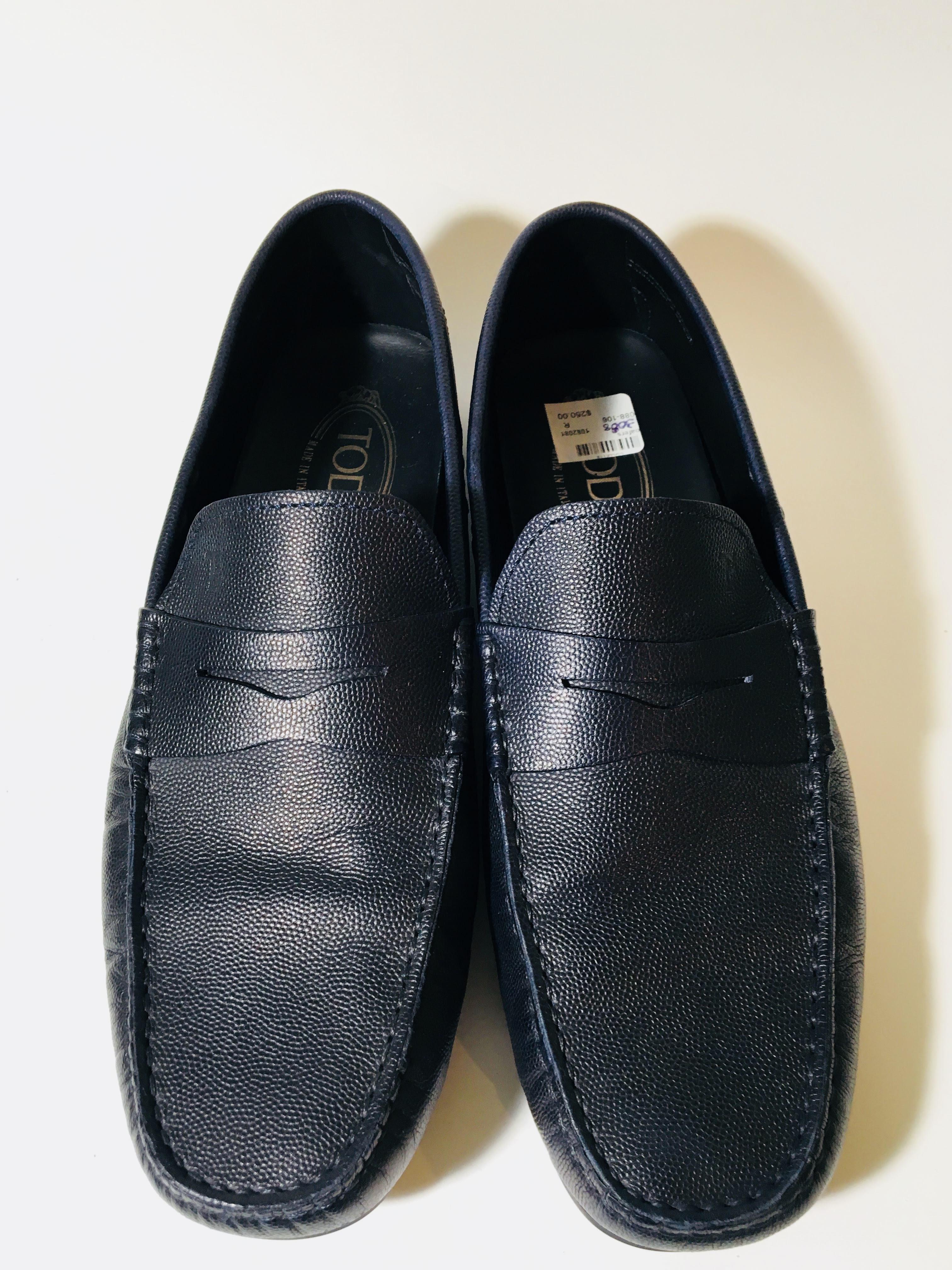 Round Toe Navy Leather Penny Loafers with Rubber Studded Soles.