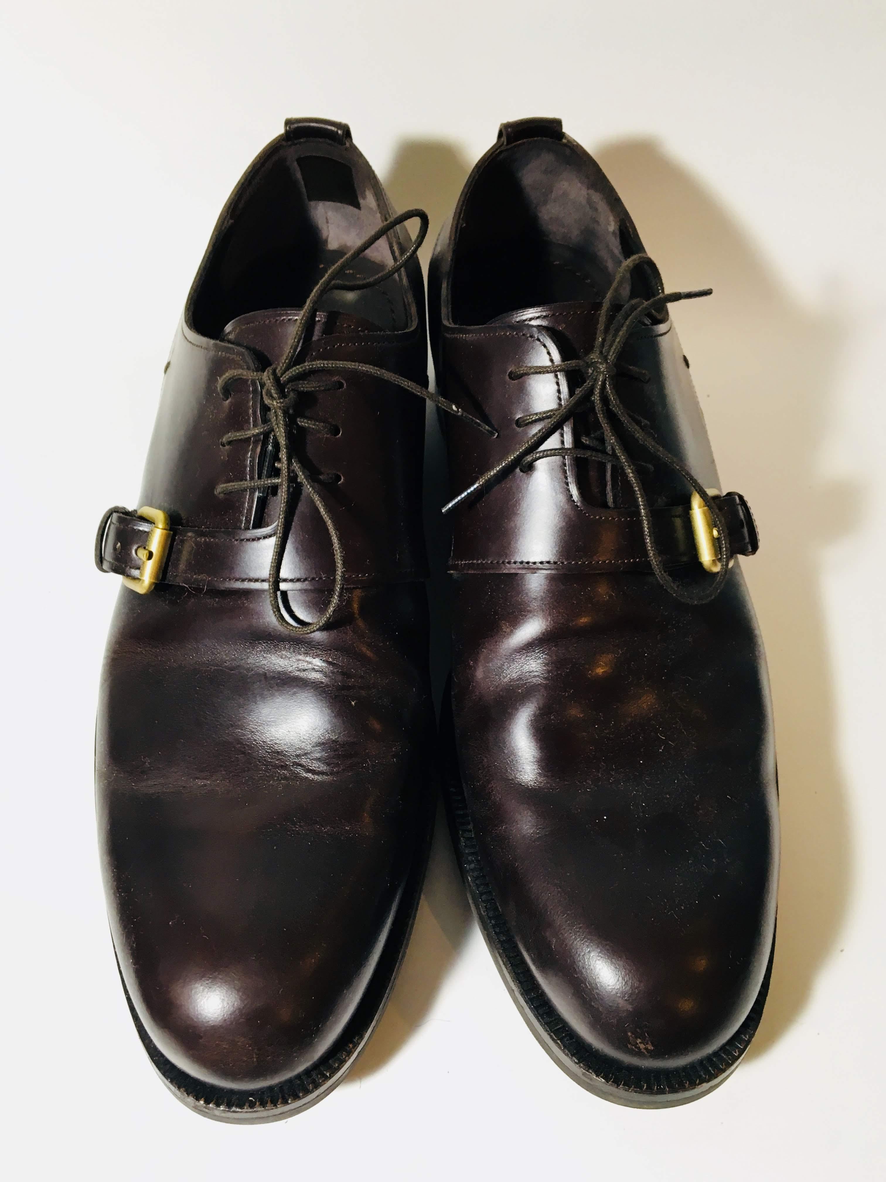 Brown Leather Louis Vuitton Dress Shoes. Lace up with Gold Buckle. 