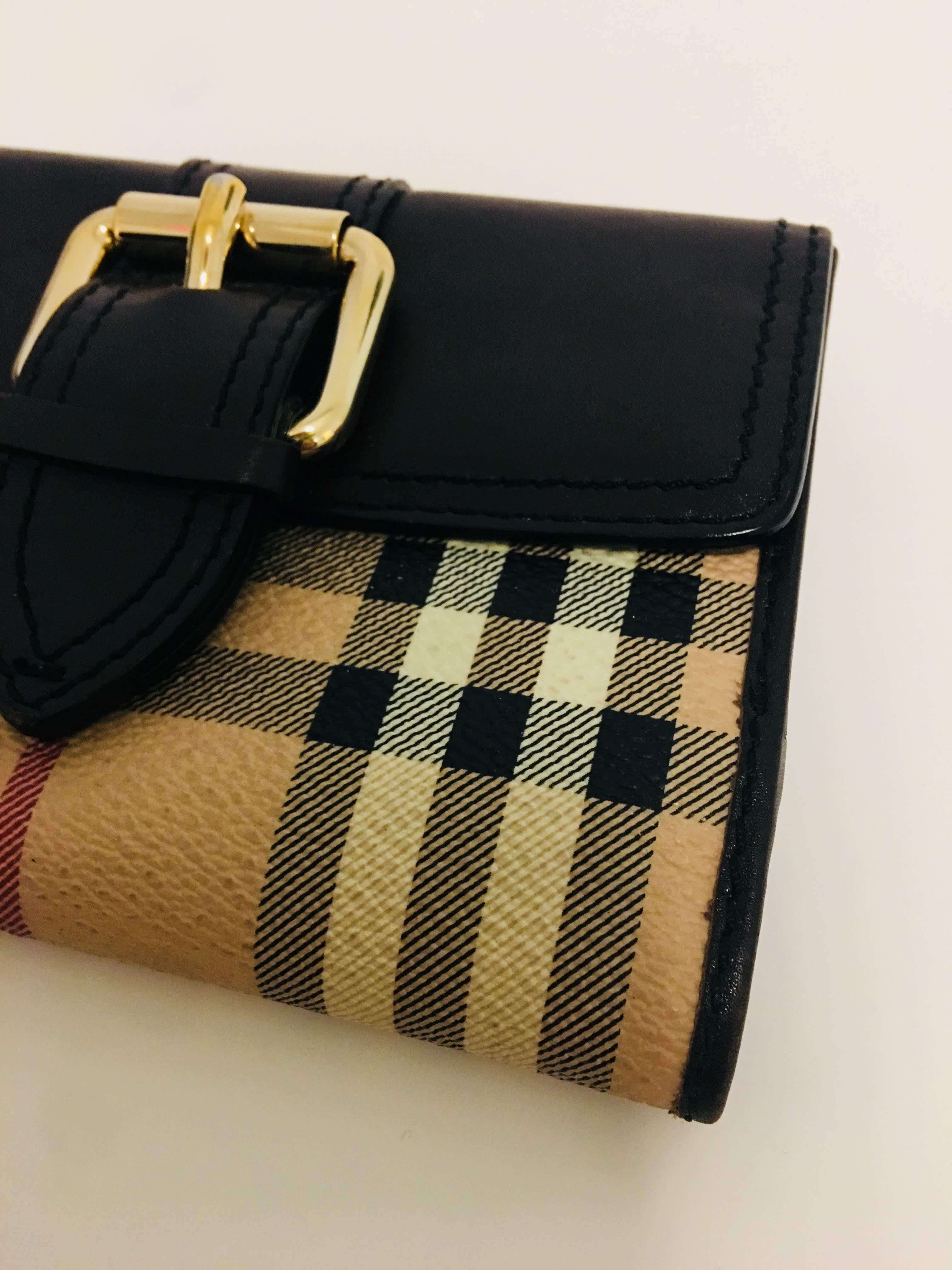 Burberry Beige Leather Wallet with Signature Plaid, Trim-Fold Style with Gold Buckle and Dark Brown Leather Details. Credit Card and Cash Slots.