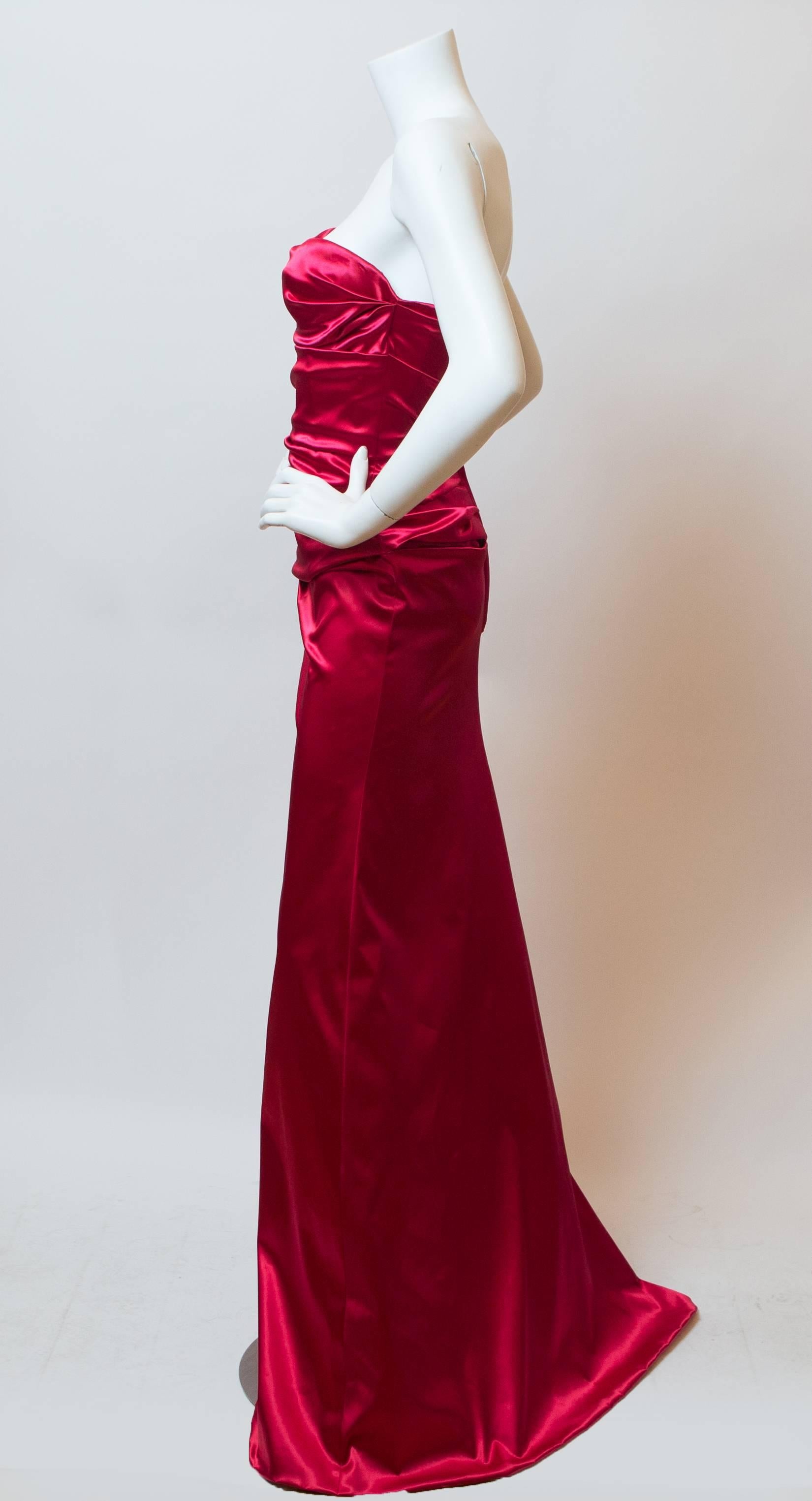 Dolce & Gabbana silk fuscia stretch strapless gown.