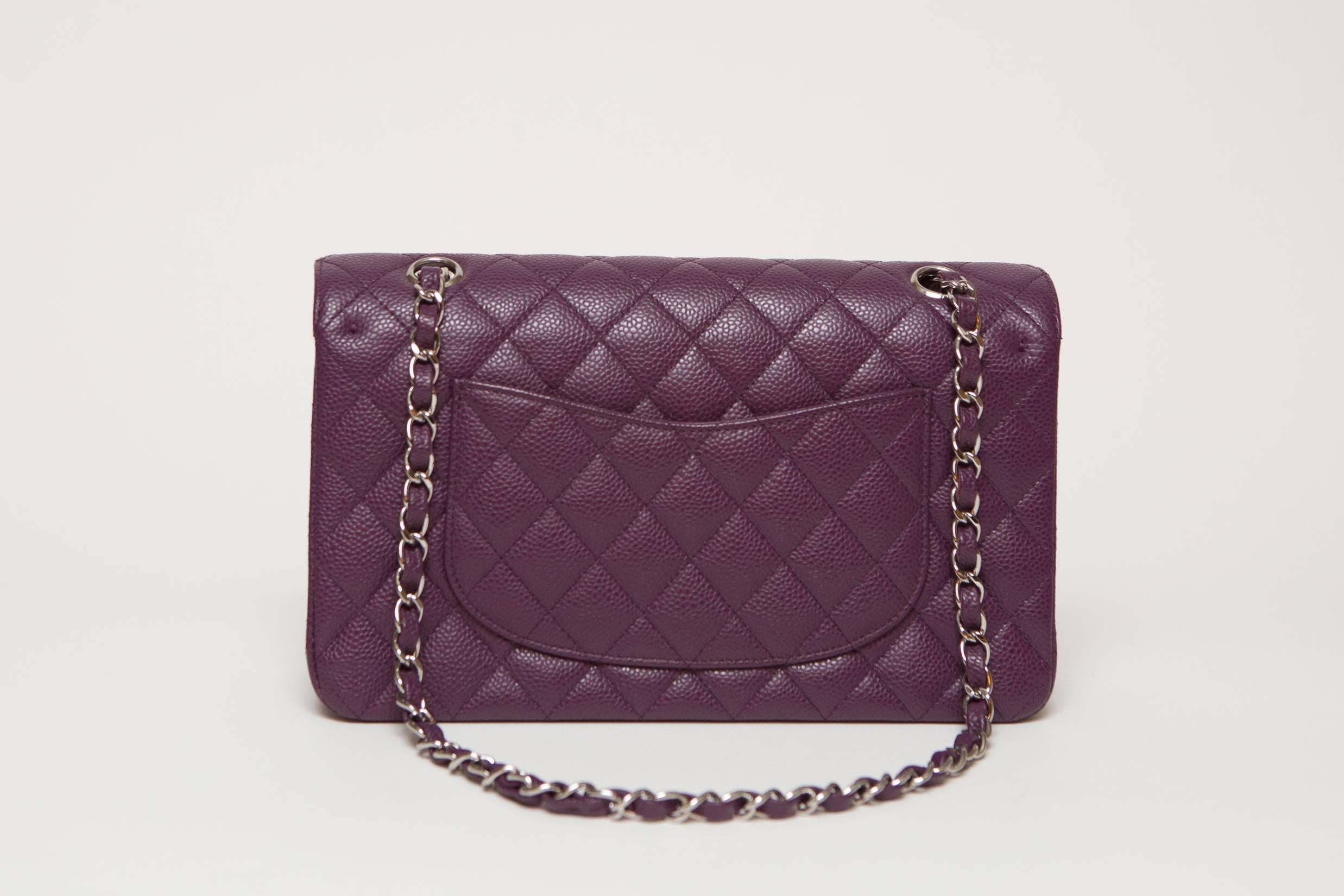 Chanel Purple Leather Maxi Classic 2.55. ID: 10995705 NEW, never worn.
Year: 2005-2006.
