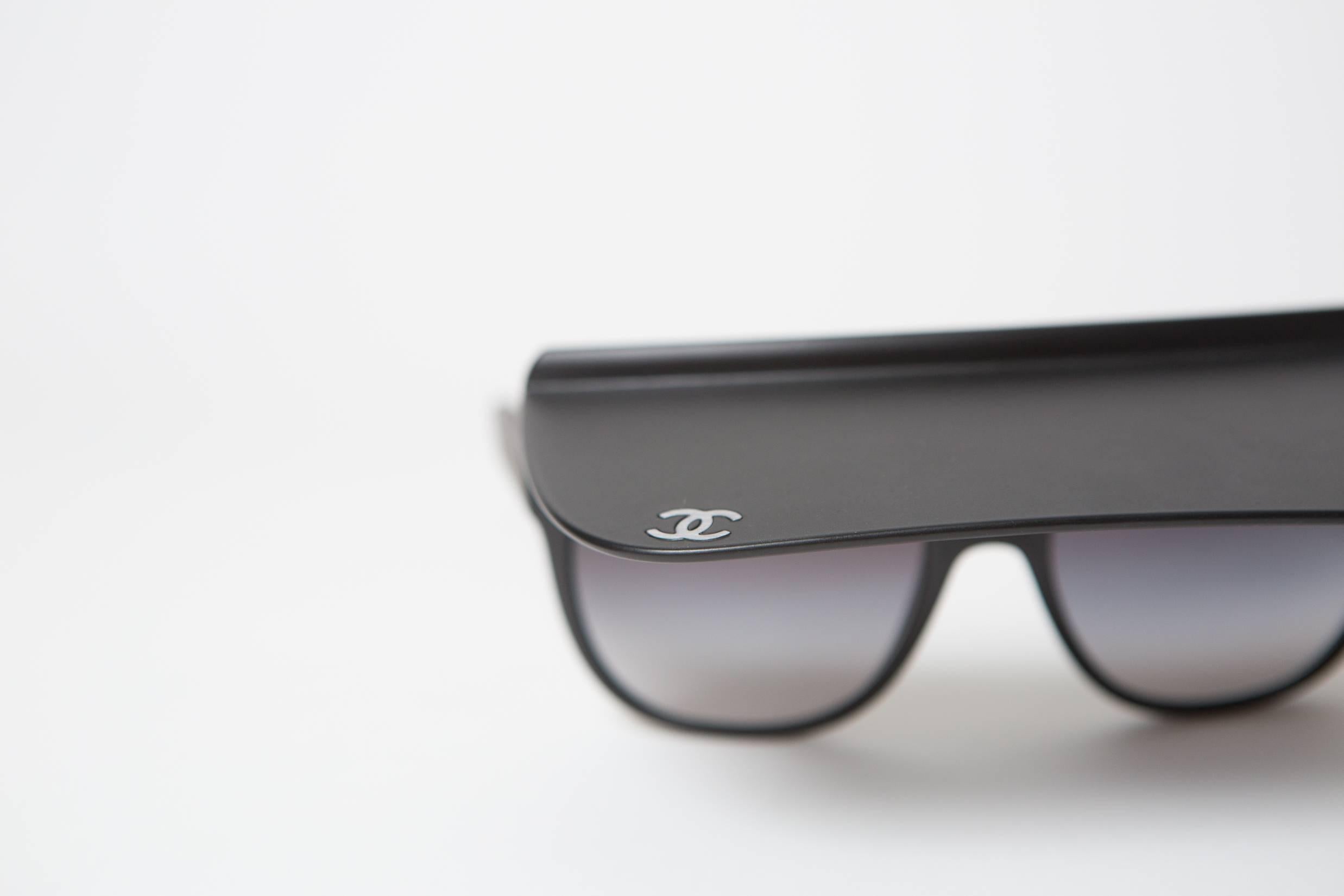 Chanel black sunglasses with visor from Spring/Summer 2014 runway.
