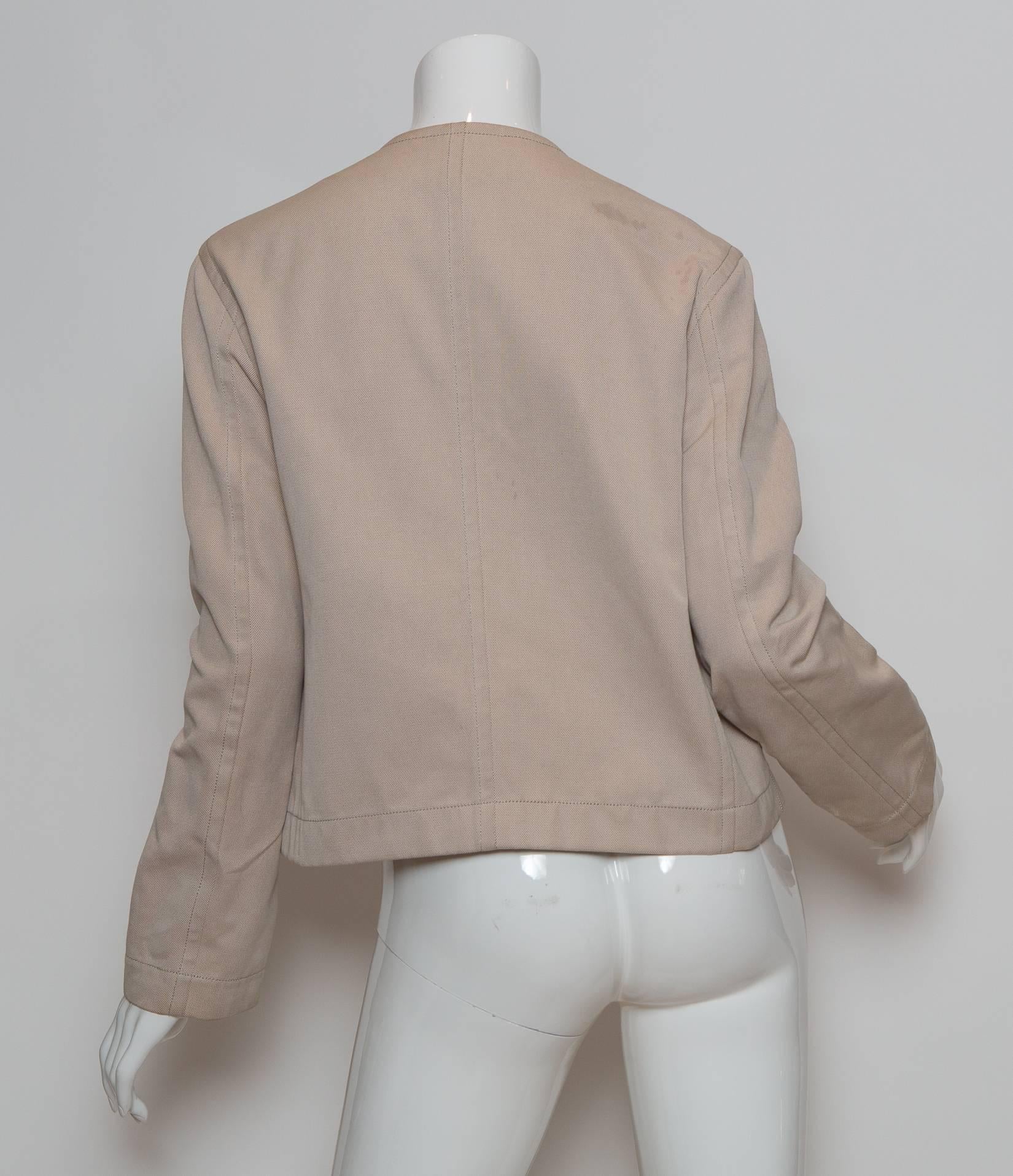 Hermes tan cotton jacket with silver toggles, and lamb skin detail.
