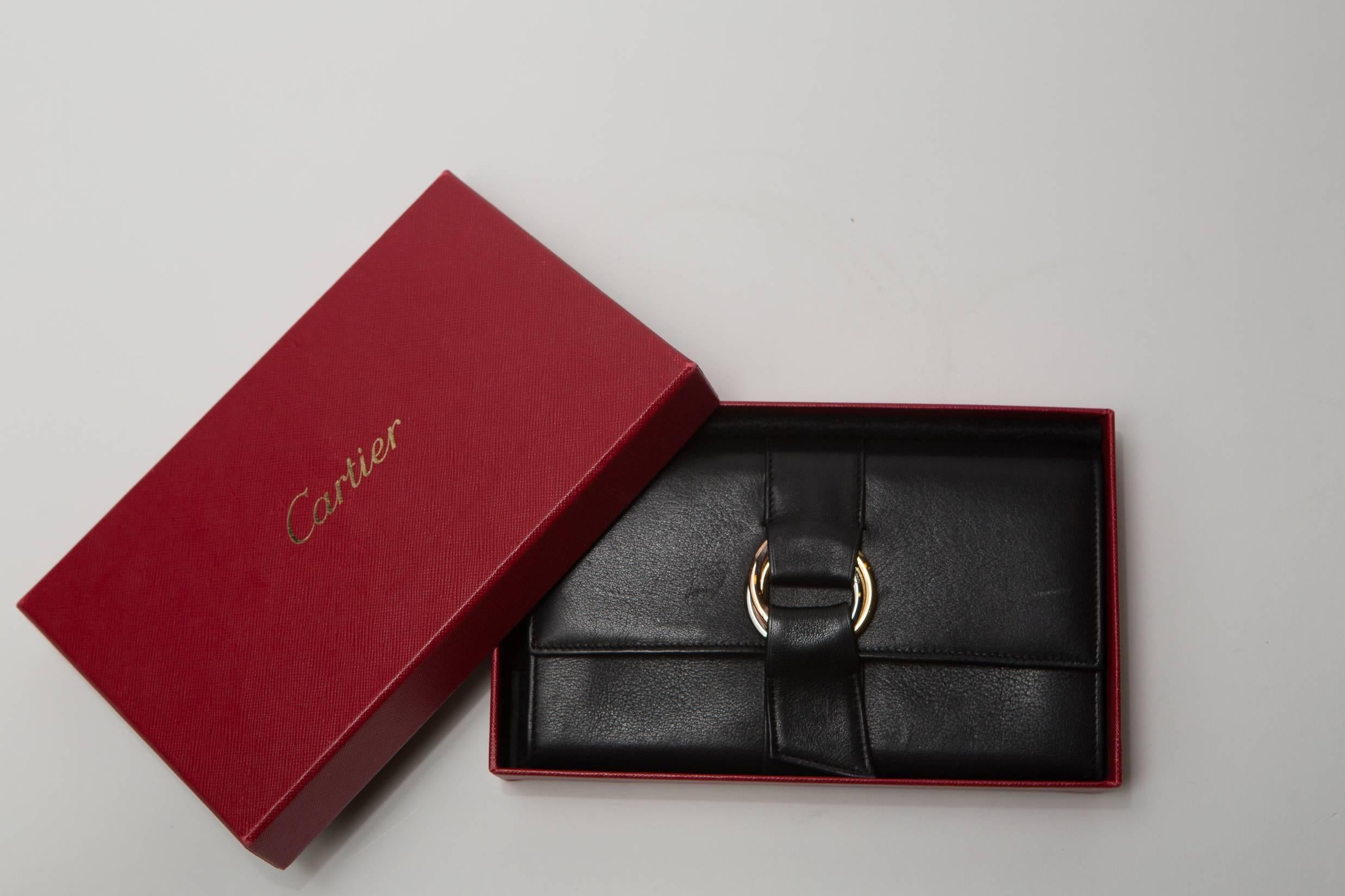 Cartier Black Leather Wallet with Gold Signature Hardware In Excellent Condition In Bridgehampton, NY