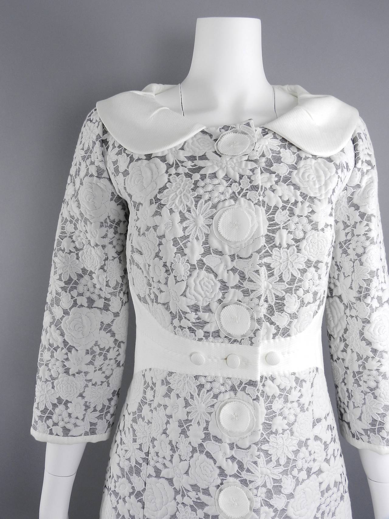 Louis Vuitton white cotton floral jacket. Textured illusion lace with peter pan collar and snap closures down front. Excellent clean condition. Tagged size FR 38 (USA 6) to fit 34