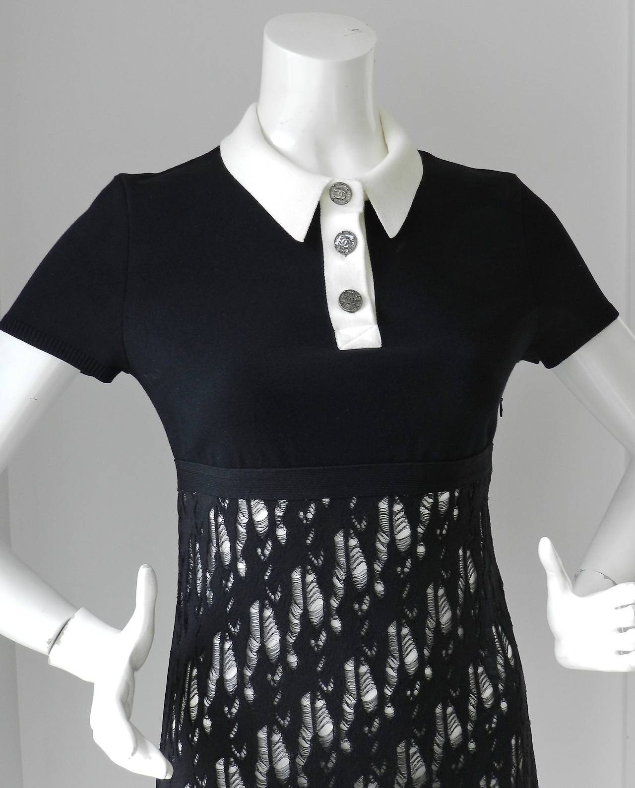 Chanel black and white knit jersey stretch dress with mesh overlay. Stretchy knit jersey fabric composed of 33% cotton, 30 rayon, 22 nylon. Tagged size FR 36 but can also fit a 38 (approx. USA 4/6). Bust to fit 34