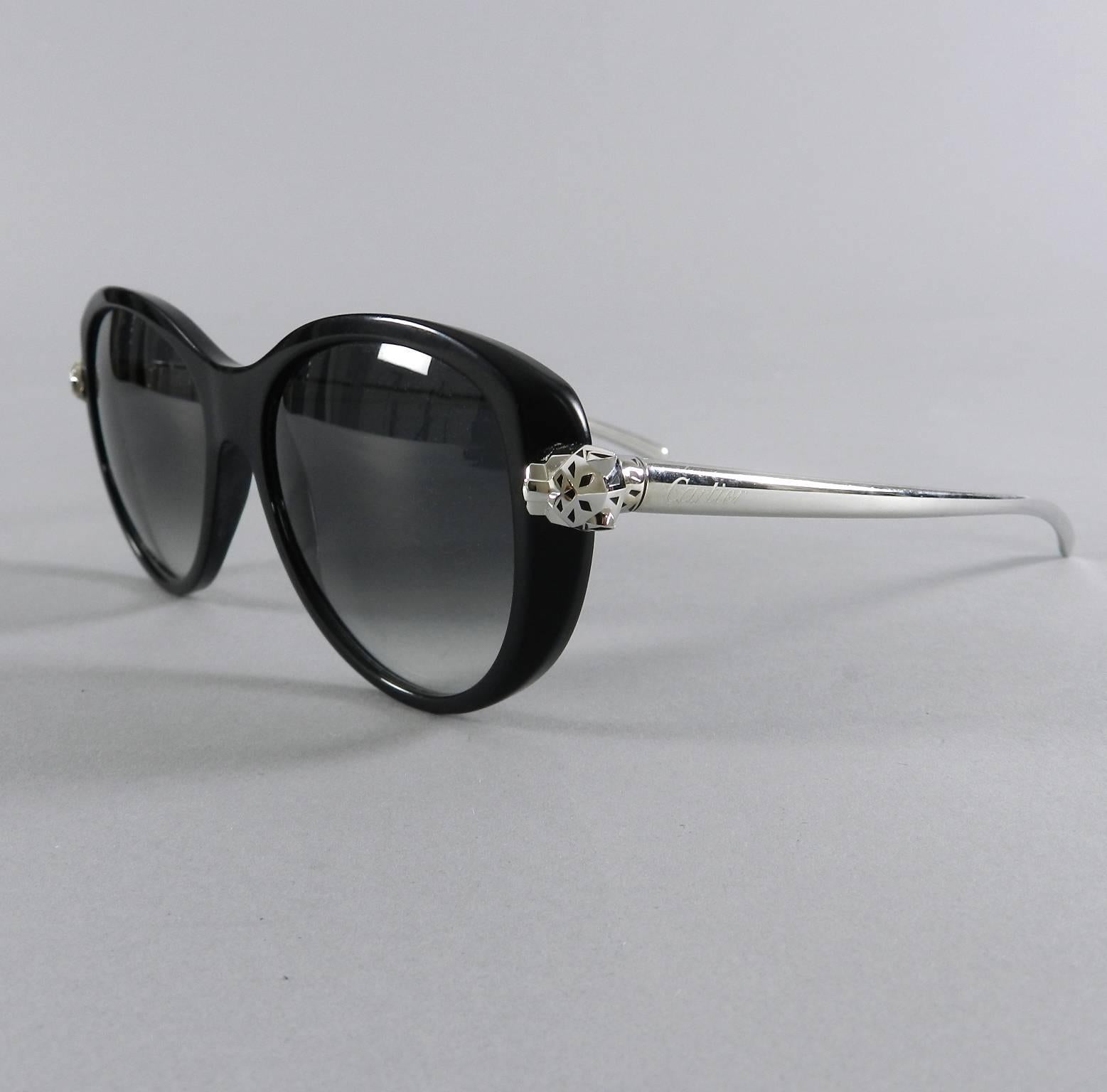 Cartier Panthere wild collection black sunglasses. Very good pre-owned condition with case. Interior arm reads Made in France - 6020248. Front face measures about 5.5