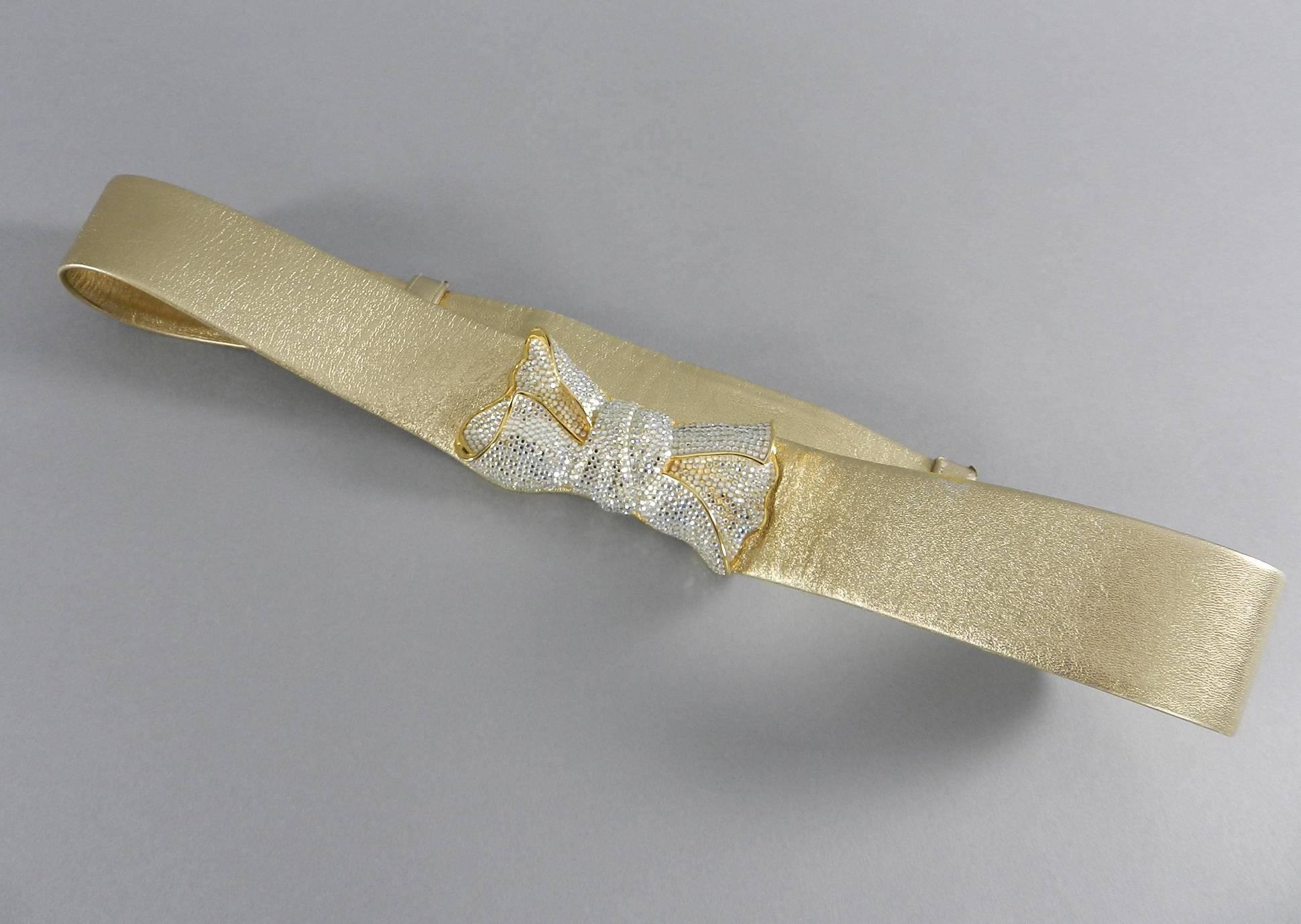 Judith Leiber 1980's Gold leather and Swarovski Crystal Bow Belt. Bow buckle measures about 3.75 x 1.75