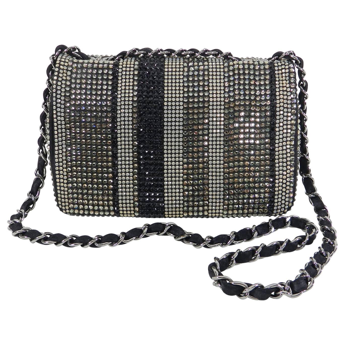 Chanel limited edition strass swarovski crystal embellished classic flap bag. Black suede body with classic chain strap. Mini (rectangle) size measuring 8 x 5.25 x 2