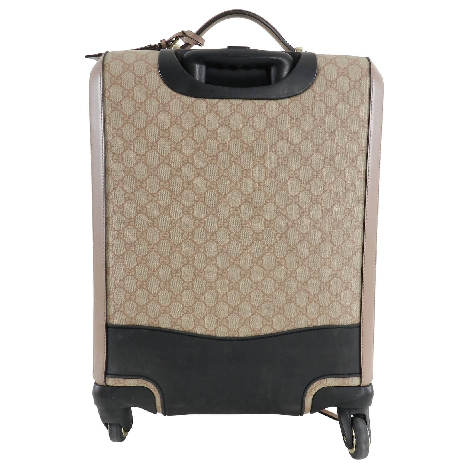 gucci wheeled luggage