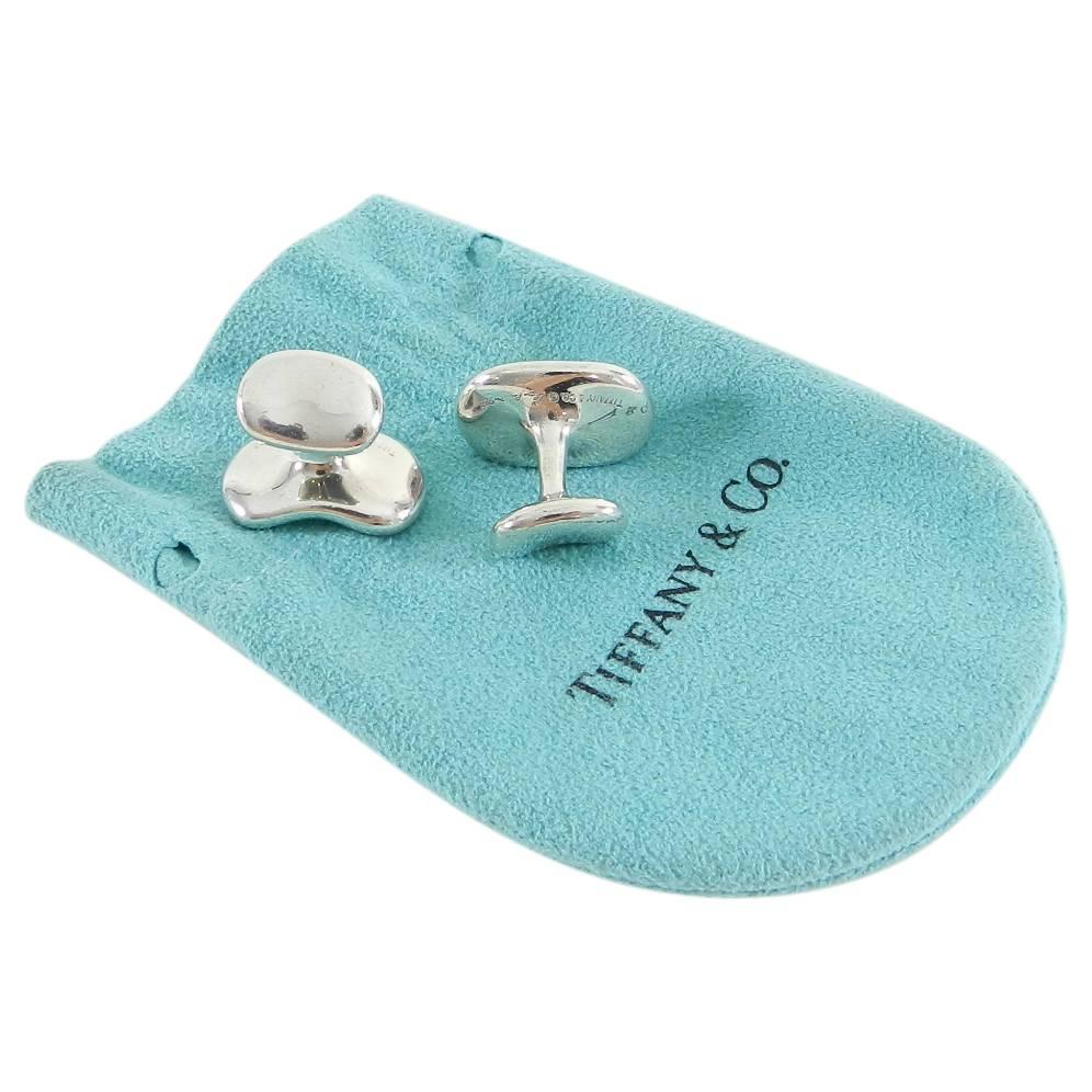 Tiffany and Co. x Elsa Peretti Sterling Silver Bean Cufflinks.  Hallmarked Tiffany and Co. Elsa Peretti 925.  Front face measures about 19 x 14mm. Excellent pre-owned.