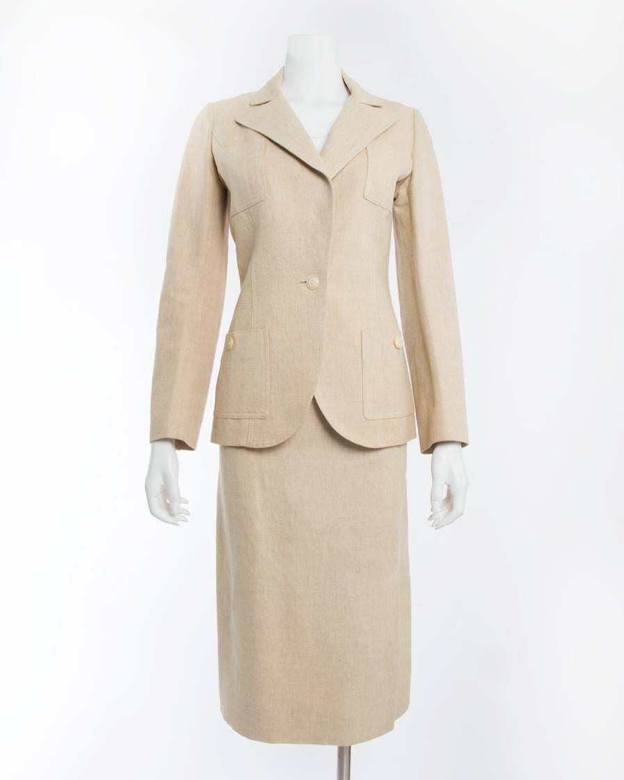 Vintage Hermes 1970’s Natural Linen Skirt Suit. Blazer fastens with single front button and features notched collar and pockets at front chest and hip. Marked size FR 40 but best for USA 6.  Skirt waist measures 27” and skirt hip 38”.  Total length
